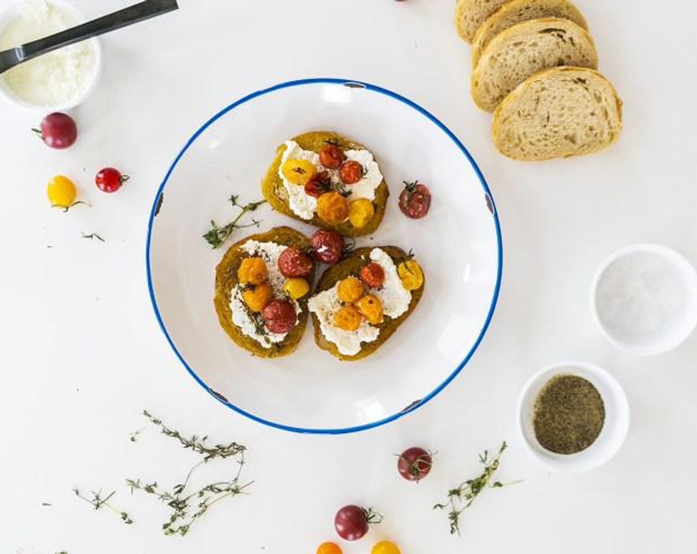 step 5 Spread Ricotta Cheese (1 cup) on toasted sourdough and top with tomatoes. Season with Salt (to taste) and Ground Black Pepper (to taste), if needed. Serve and enjoy!