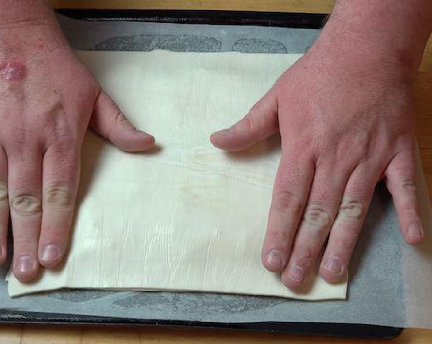 step 5 Layer the second sheet of puff pastry over the top and press down lightly.