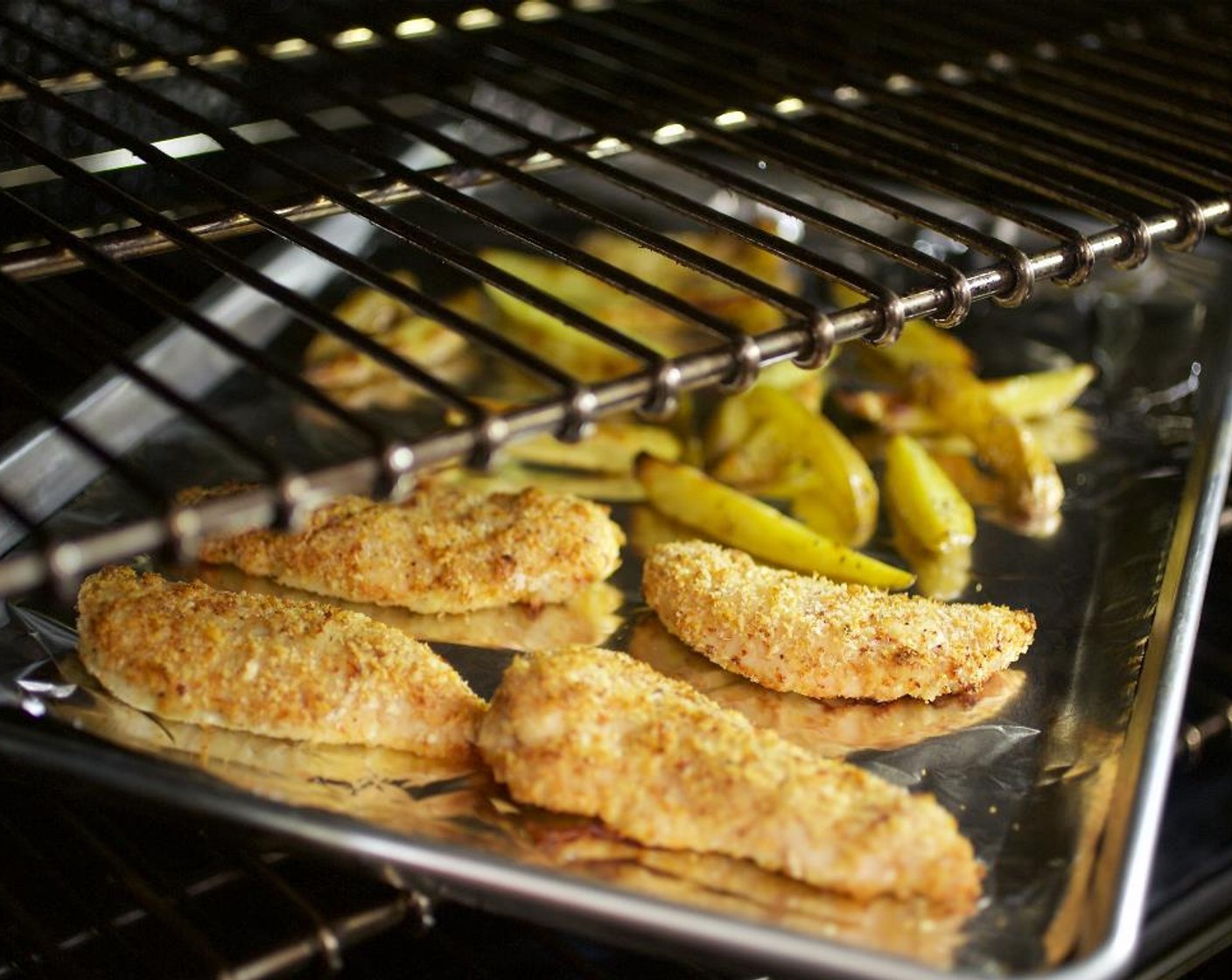 step 9 Bake in the oven for 30 minutes. Remove from oven when potatoes are fork tender and chicken is cooked.