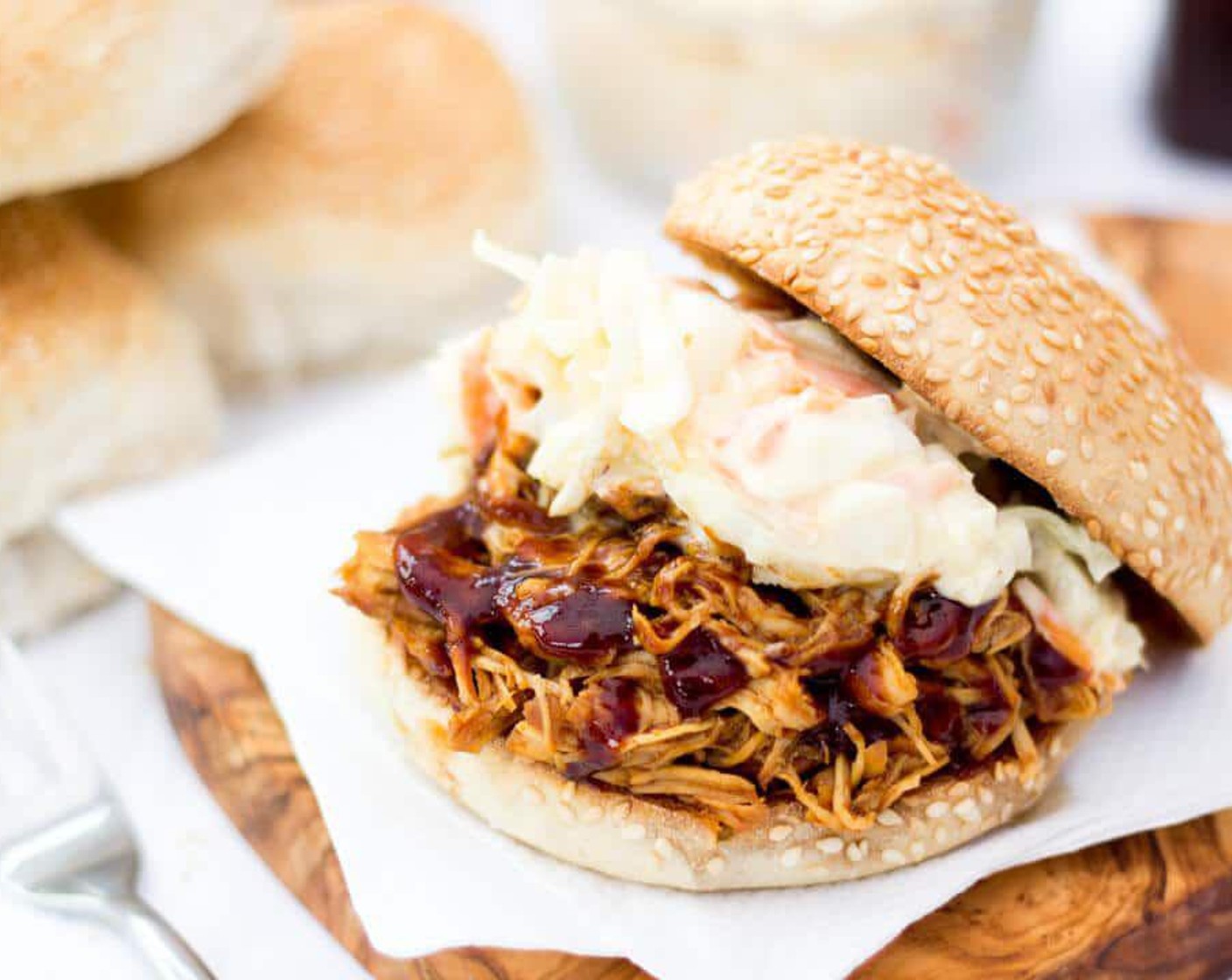 step 5 Take one breast out at a time & shred in a bowl using the backs of two forks together. When it’s all nicely shredded, dump it back into the slow cooker for 10 – 15 minutes on warm to soak up all those lovely BBQ juices!