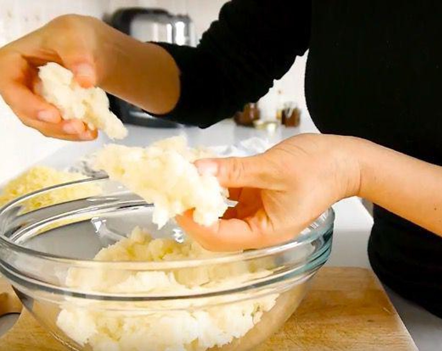 step 3 Once the cassava is cold remove the central vein from each piece should it have it. Place a handful of cassava at the time into the food processor and blend until is come into a ball inside the processor. Repeat the process for all the cassava. With all cassava processed add the Feta Cheese (2/3 cup) and kneed until well combined. This is a very sticky dough.