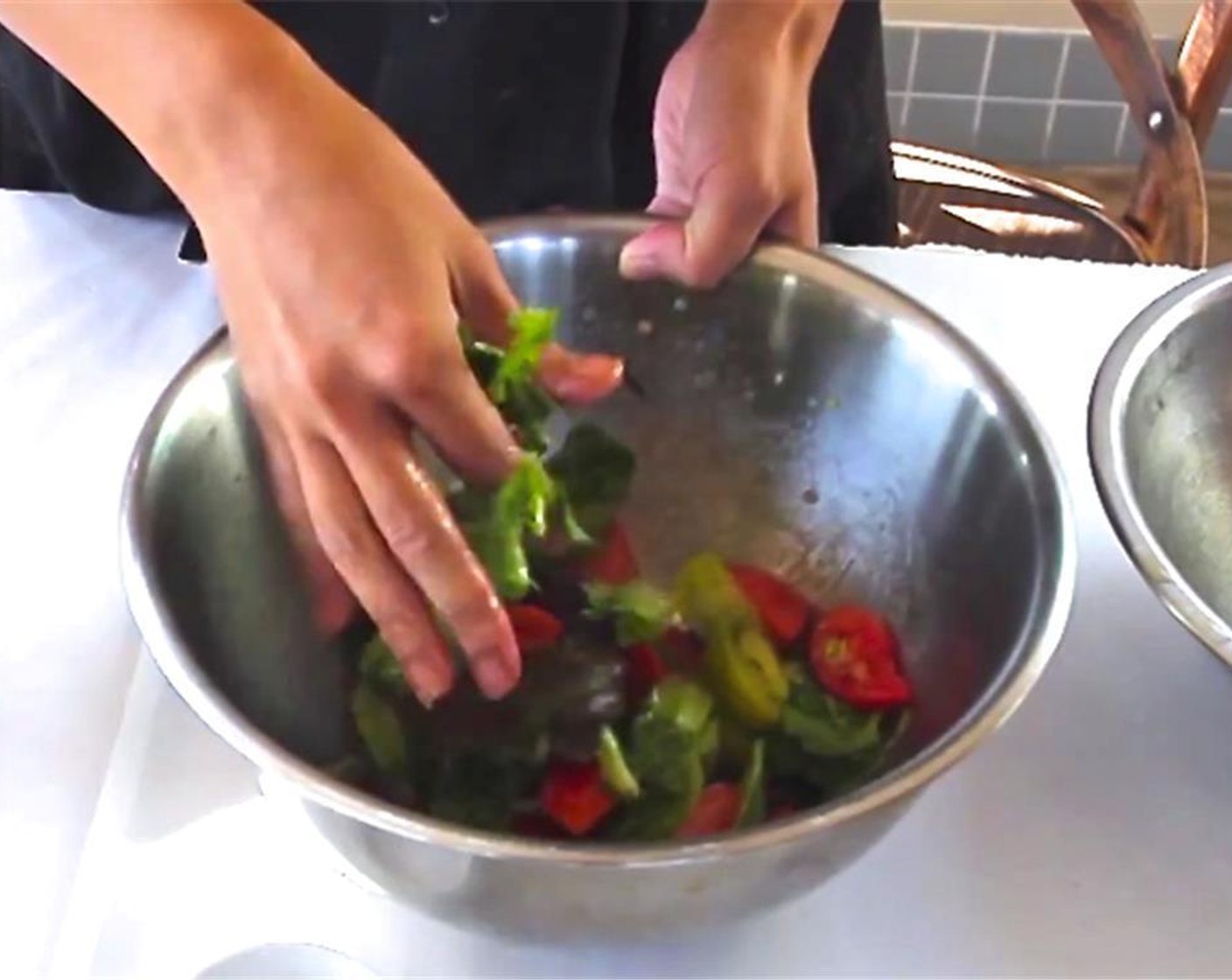 step 2 Toss to combine. Add Spring Mix Greens (2 cups) and bittermelon leaves, then toss again.
