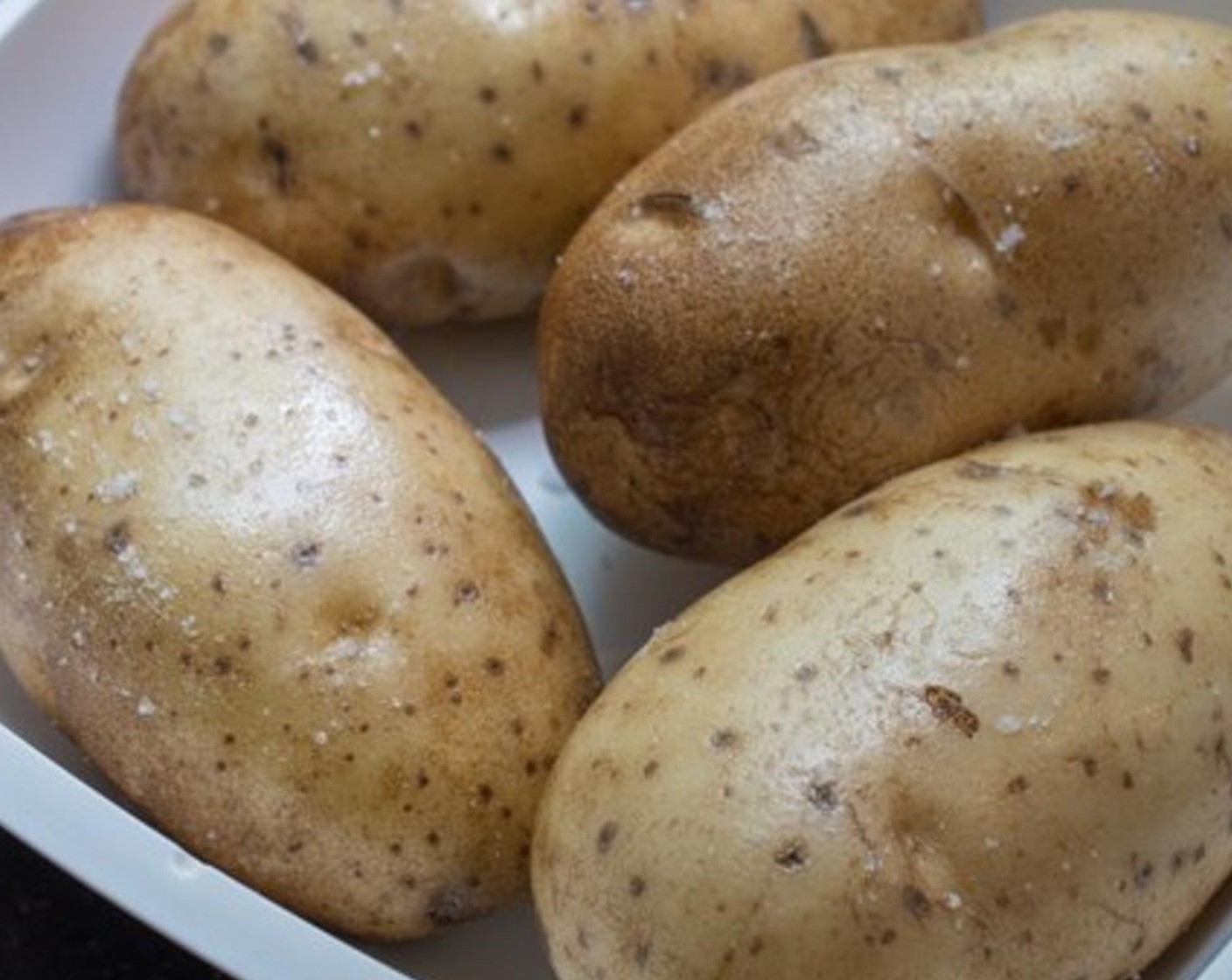 step 2 Thoroughly wash and scrub the Russet Potatoes (4). Pat them dry, then allow them to air-dry.