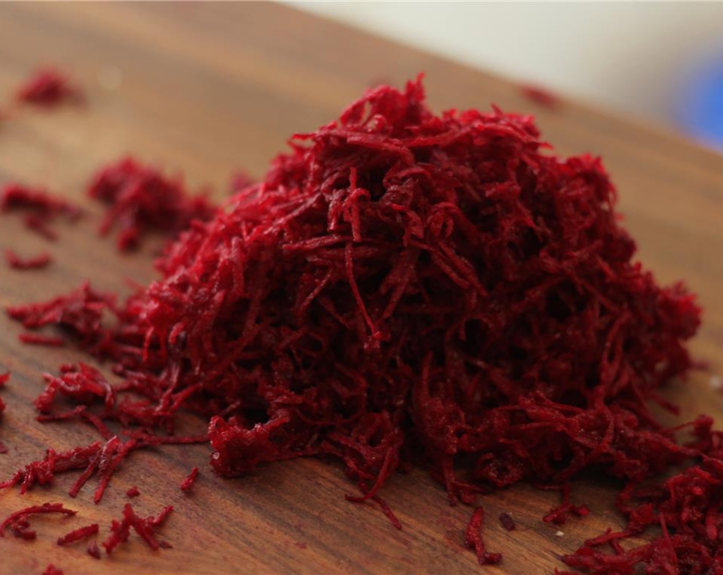 step 2 Wash and peel the Beets (2). Finely grate 1 of them, and slice the other thinly with a mandolin.