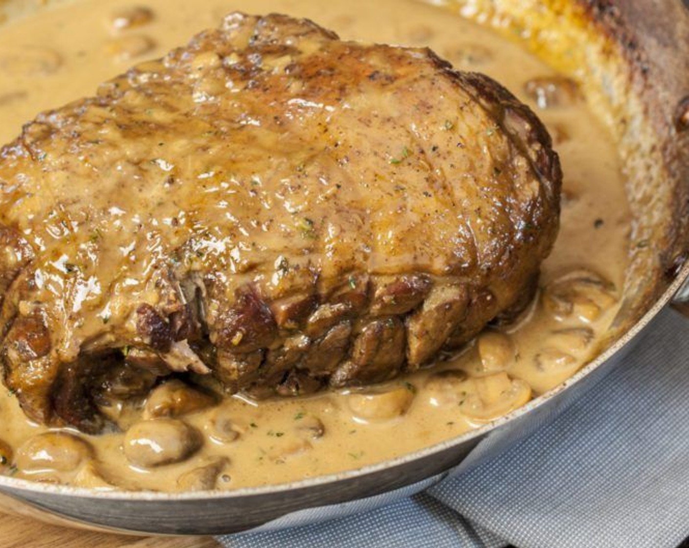 step 8 Remove from oven and carefully lift roast out of pan onto a plate. Cover with foil and allow to rest while completing sauce. Remove bay leaf and thyme sprigs and discard.