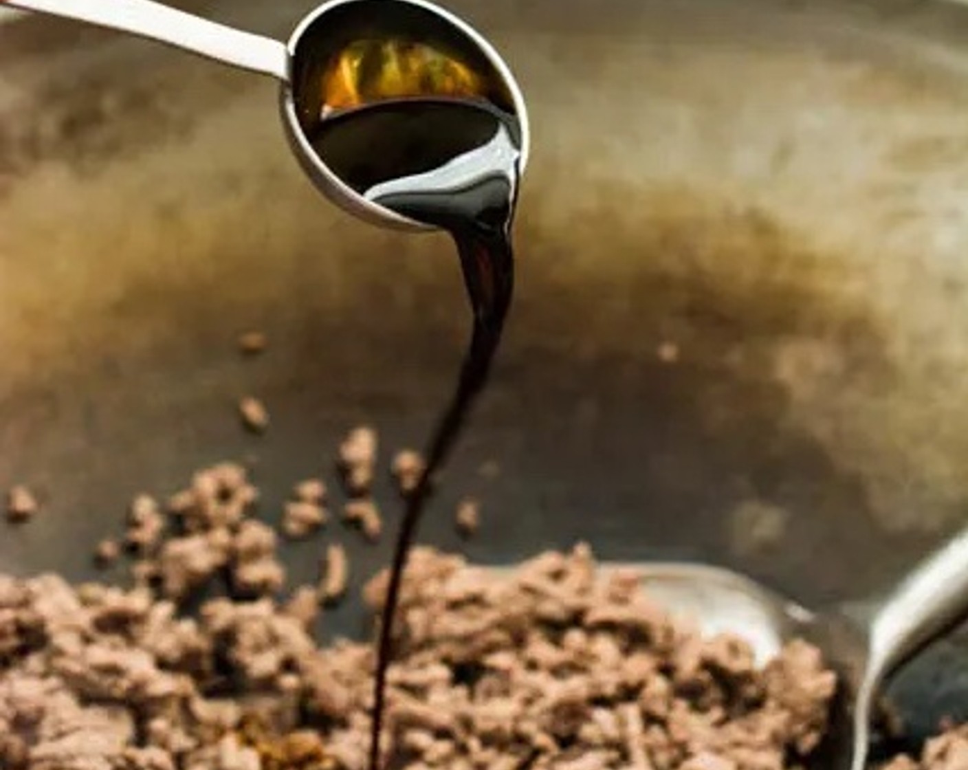 step 3 Add Light Soy Sauce (2 Tbsp), Brown Sugar (2 Tbsp), and Sesame Oil (3 Tbsp). Stir well to combine all the ingredients.