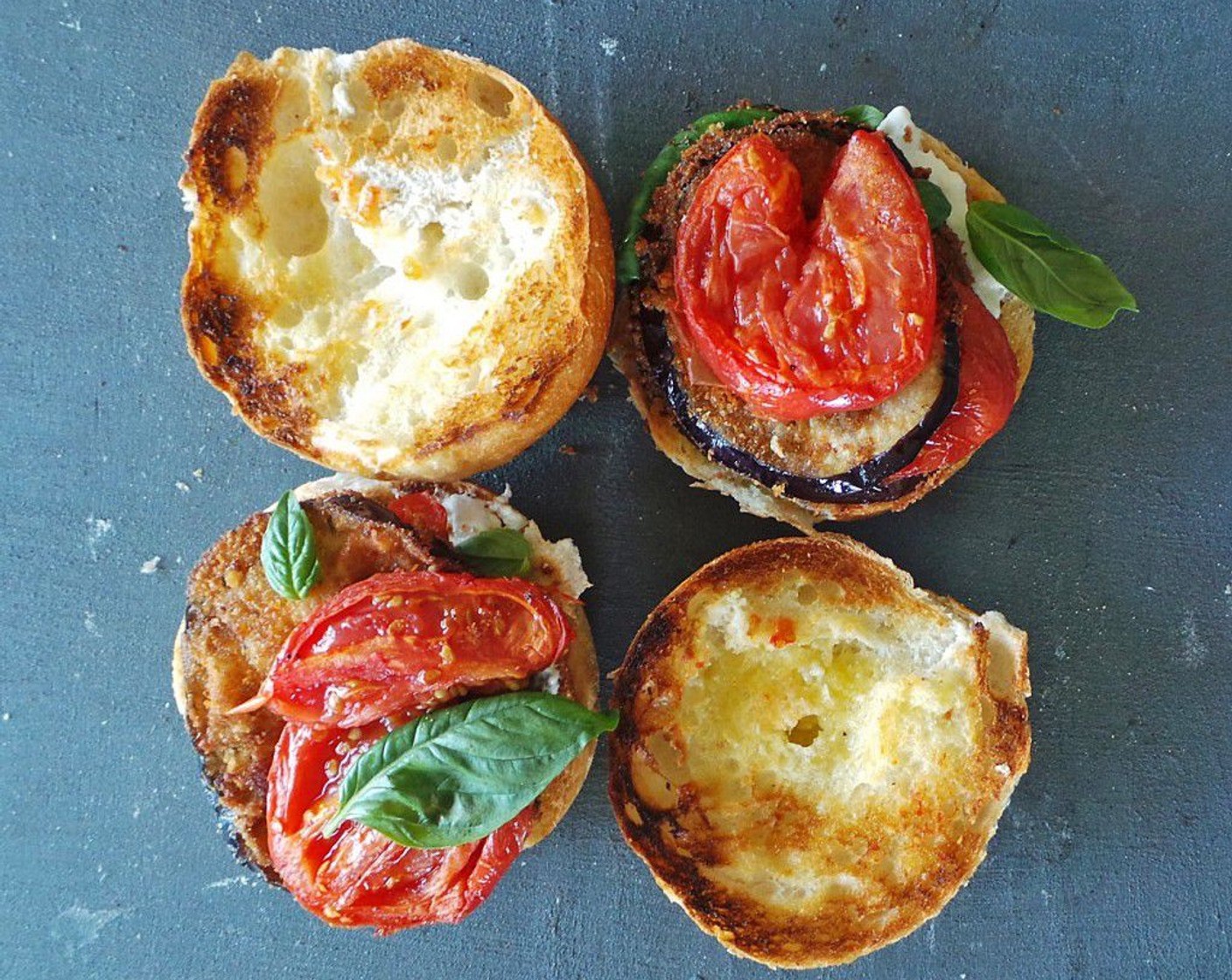 step 10 Create sandwich by spreading layer of Burrata Cheese (1 piece) then top with eggplant, roma tomatoes, and Fresh Basil (to taste). Enjoy!