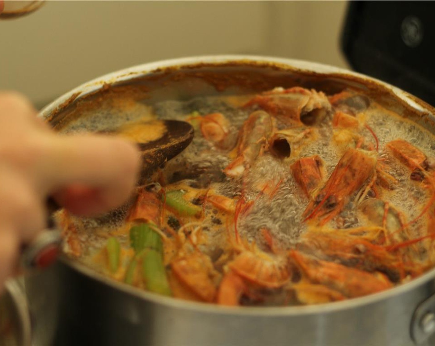 step 3 Cover partially with a lid and let simmer for 30 minutes, skimming off the foam halfway through.