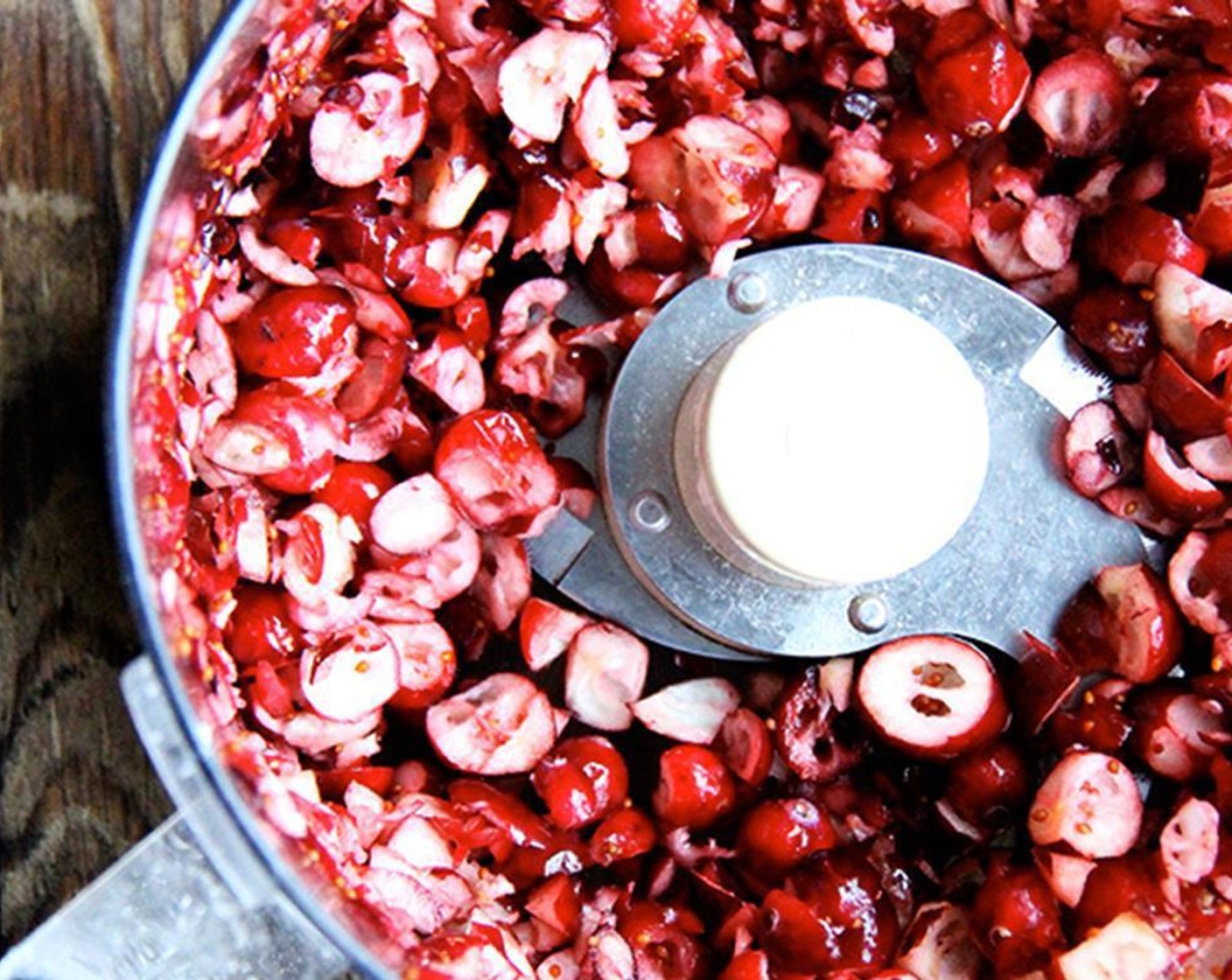 step 2 Butter a rimmed baking sheet (or line it with parchment paper). Pulse the Fresh Cranberries (2 cups) briefly in food processor.