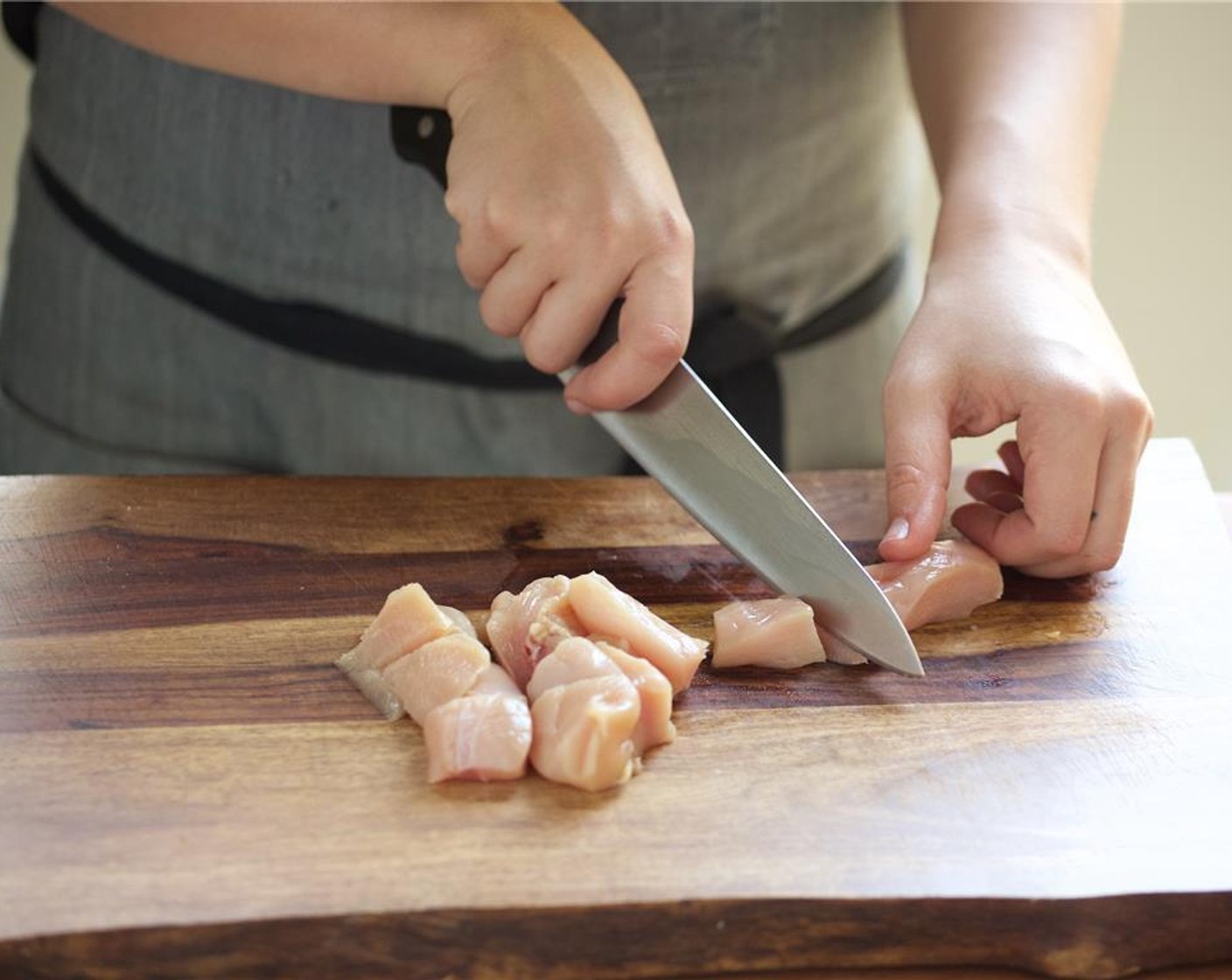 step 14 Pat Skinless Chicken Breasts (8 oz) dry with paper towels. Cut into one inch diced pieces and place in a medium bowl. Season with Salt (1/2 tsp) and Ground Black Pepper (1/4 tsp).