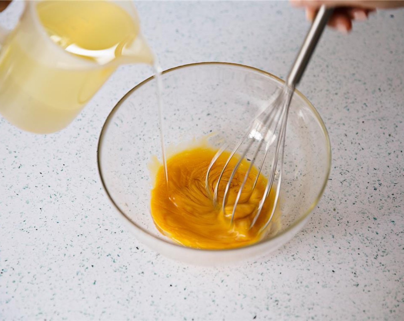 step 4 Slowly add Vegetable Oil (2 cups) to eggs and dijon mustard, whisking constantly.