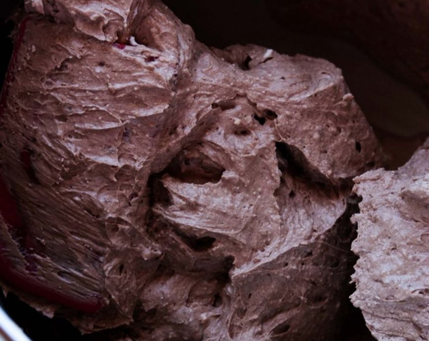 step 4 Add the Gelatin Sheet (1 tsp) and Dark Chocolate (1 cup) to the cream, stirring gently with a spatula.