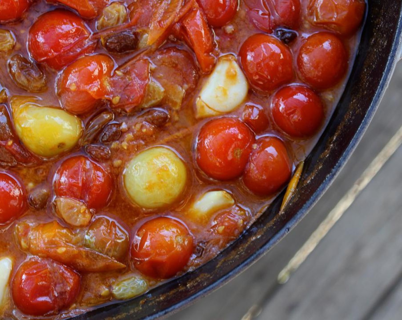 step 6 Bring to a simmer and cook for 10-15 minutes, stirring occasionally, until the tomatoes have burst and are starting to break down.