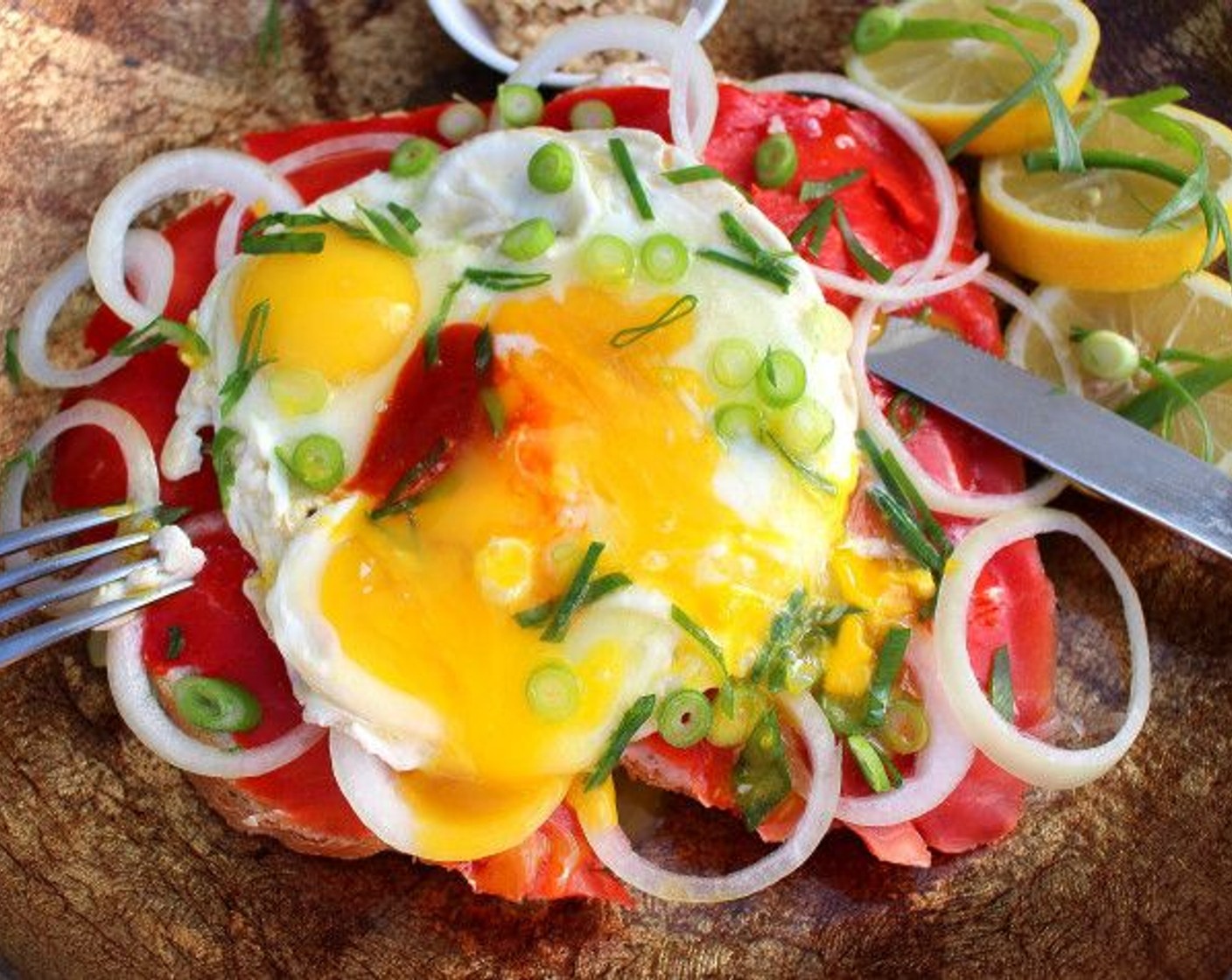 step 5 Top with the fried eggs, Sriracha (to taste) and Fresh Chives (to taste).