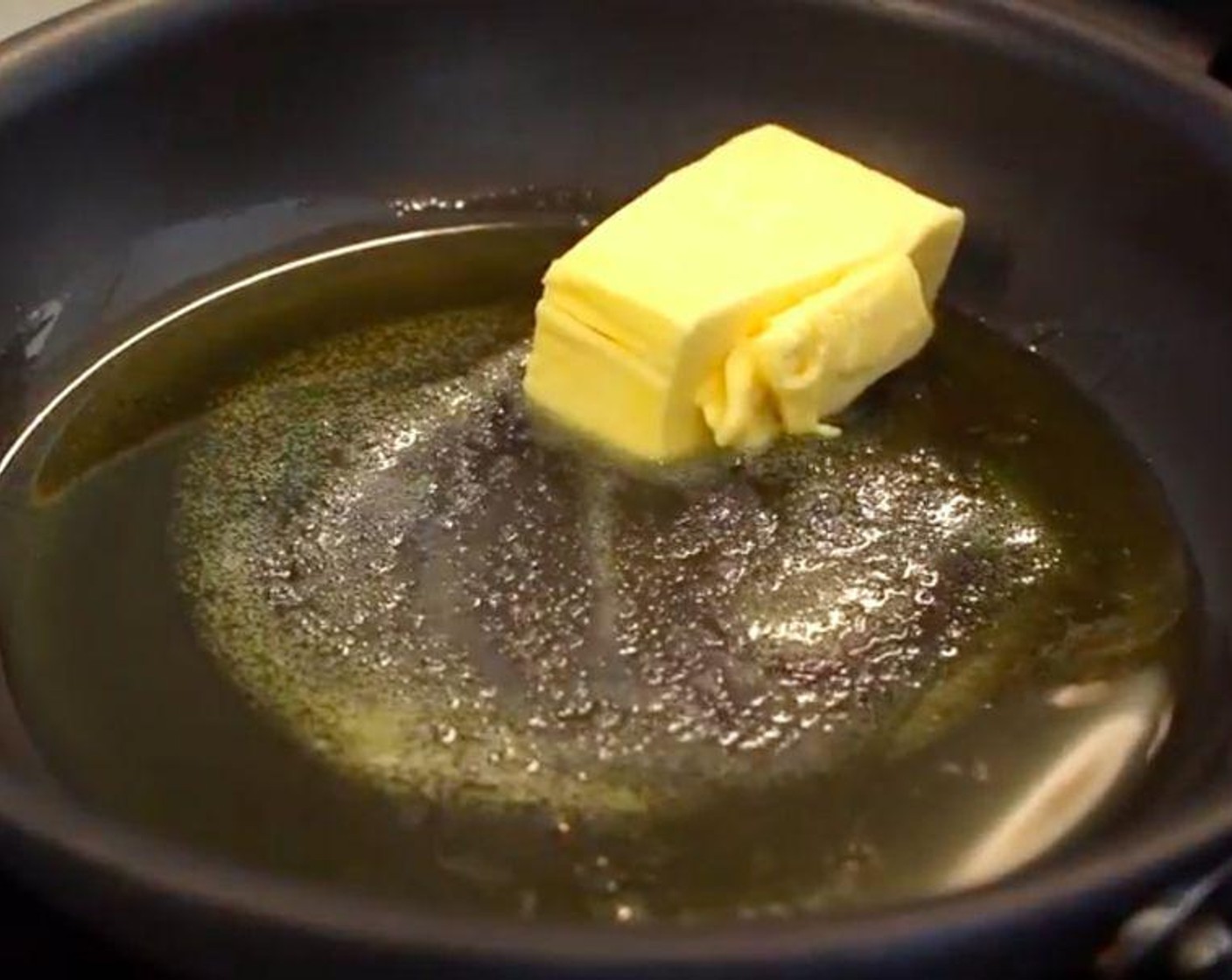 step 1 In a frying pan heat Vegetable Oil (2 Tbsp) and Butter (2 Tbsp) and bring to a medium heat.