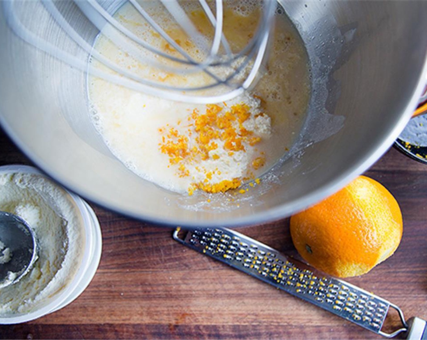 step 2 Stir Milk (1/2 cup), Granulated Sugar (1/2 cup), zest and juice from Oranges (2), Ricotta Cheese (1/2 cup), Salt (1/2 tsp) and Egg (1) into the yeast mixture.