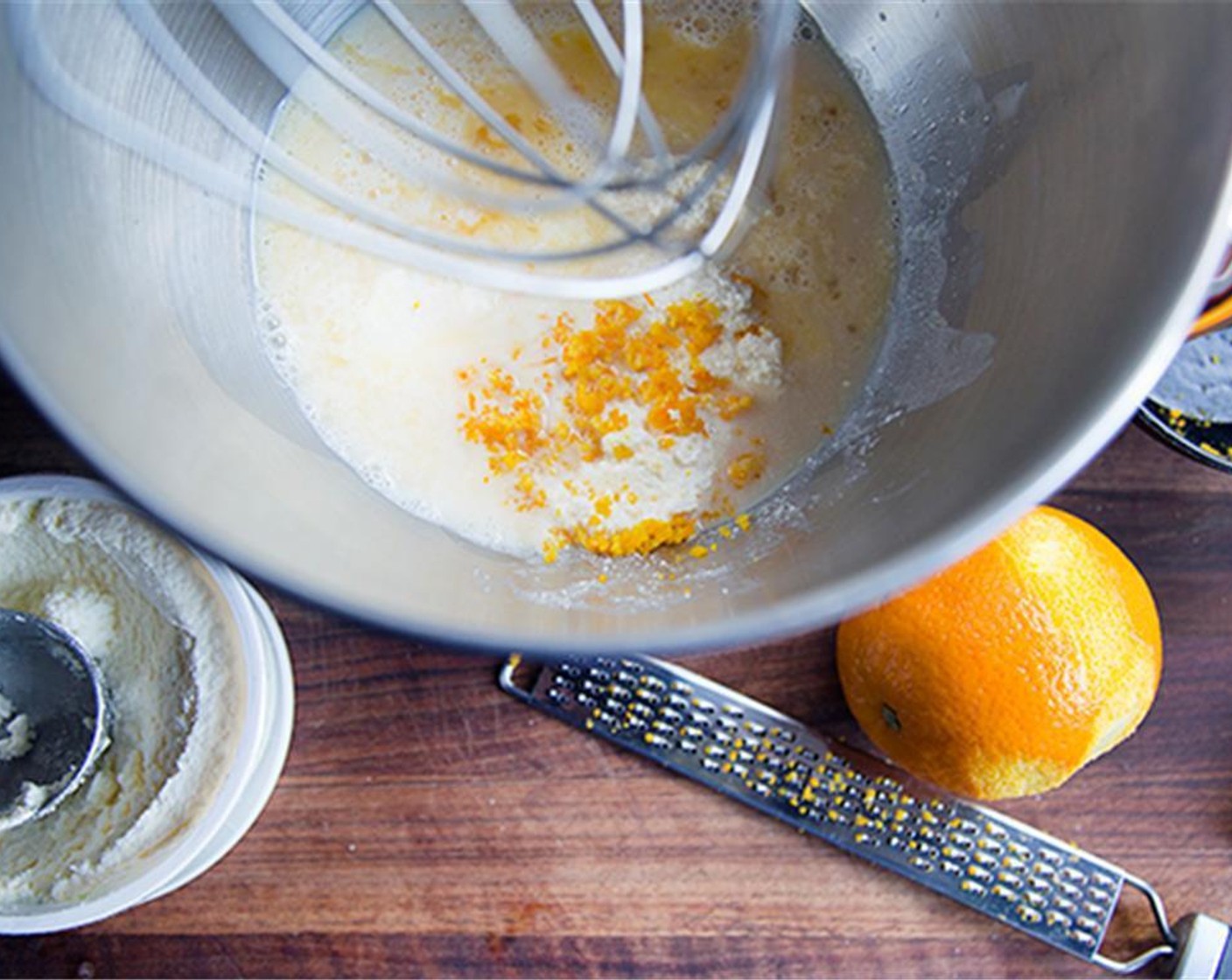 step 2 Stir Milk (1/2 cup), Granulated Sugar (1/2 cup), zest and juice from Oranges (2), Ricotta Cheese (1/2 cup), Salt (1/2 tsp) and Eggland's Best Classic Egg (1) into the yeast mixture.