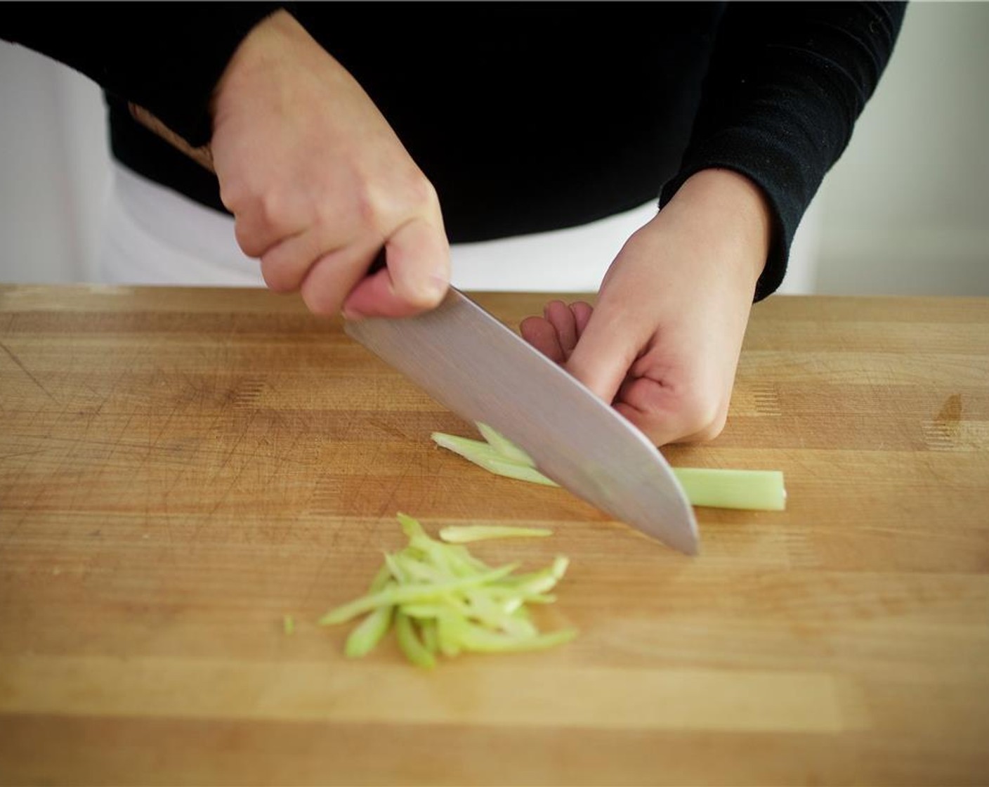 step 7 Peel Mini Cucumber (1) and slice into quarter-inch rounds. Set into a large bowl.