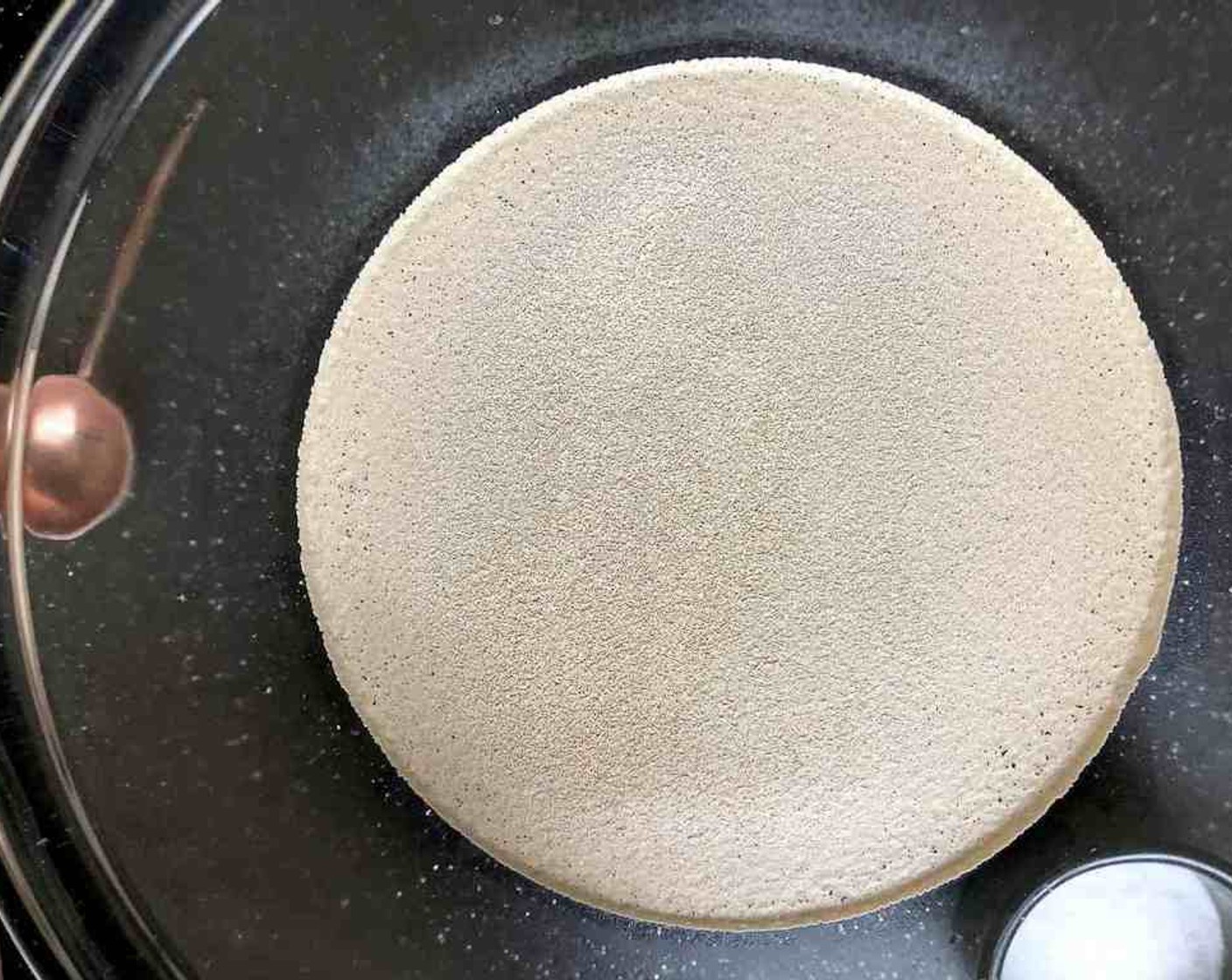 step 2 In a very large bowl or a 6-quart container with a lid, mix the Active Dry Yeast (1 Tbsp) and Kosher Salt (1 Tbsp) with the warm water.