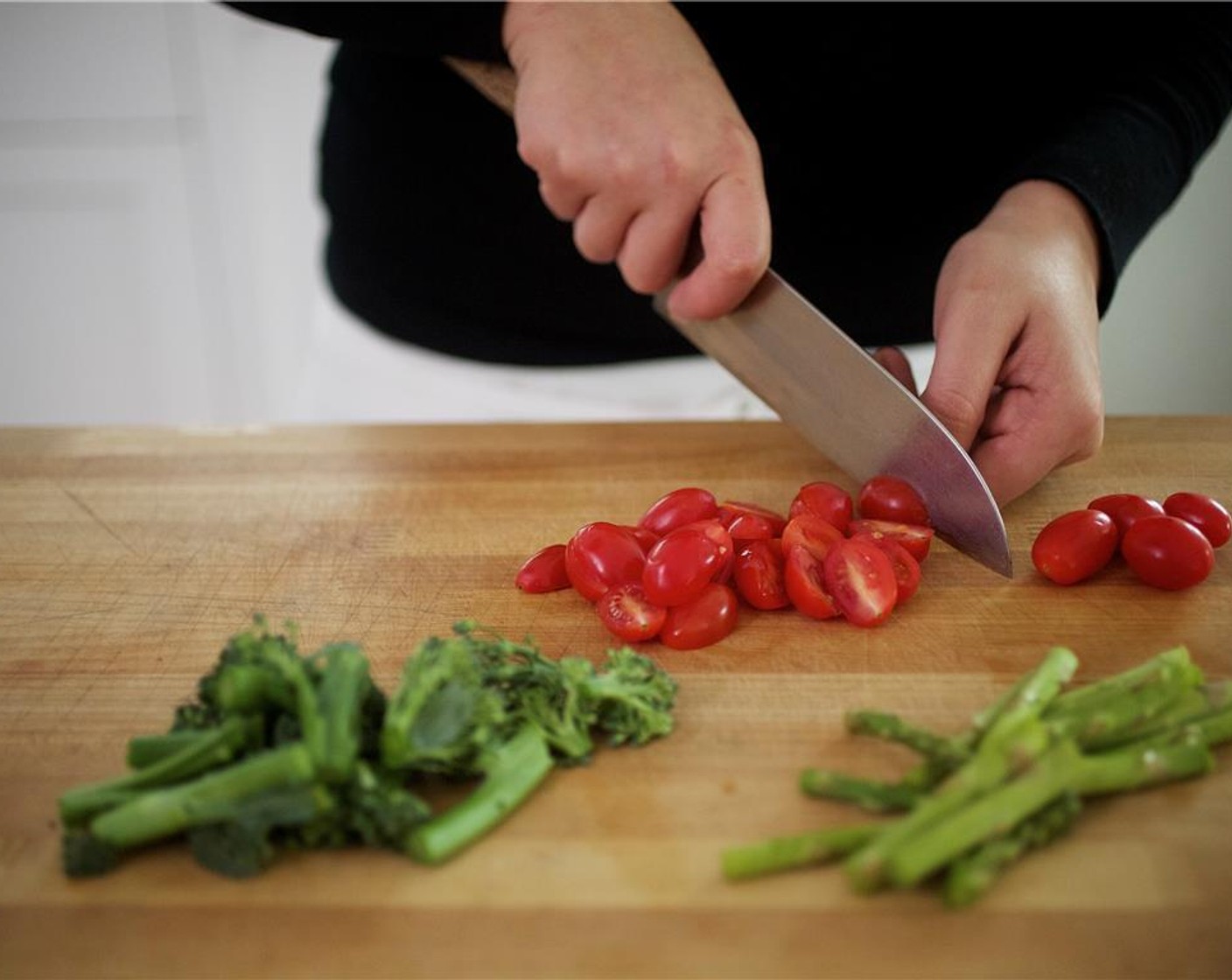 step 3 Remove one inch from the Broccolini (1 3/4 cups) stems and discard. Cut into four equal length pieces and set aside. Remove one inch from the end of the Asparagus (3/4 cup) spears. Cut into pieces on the bias, the same length as the broccolini. Set aside.