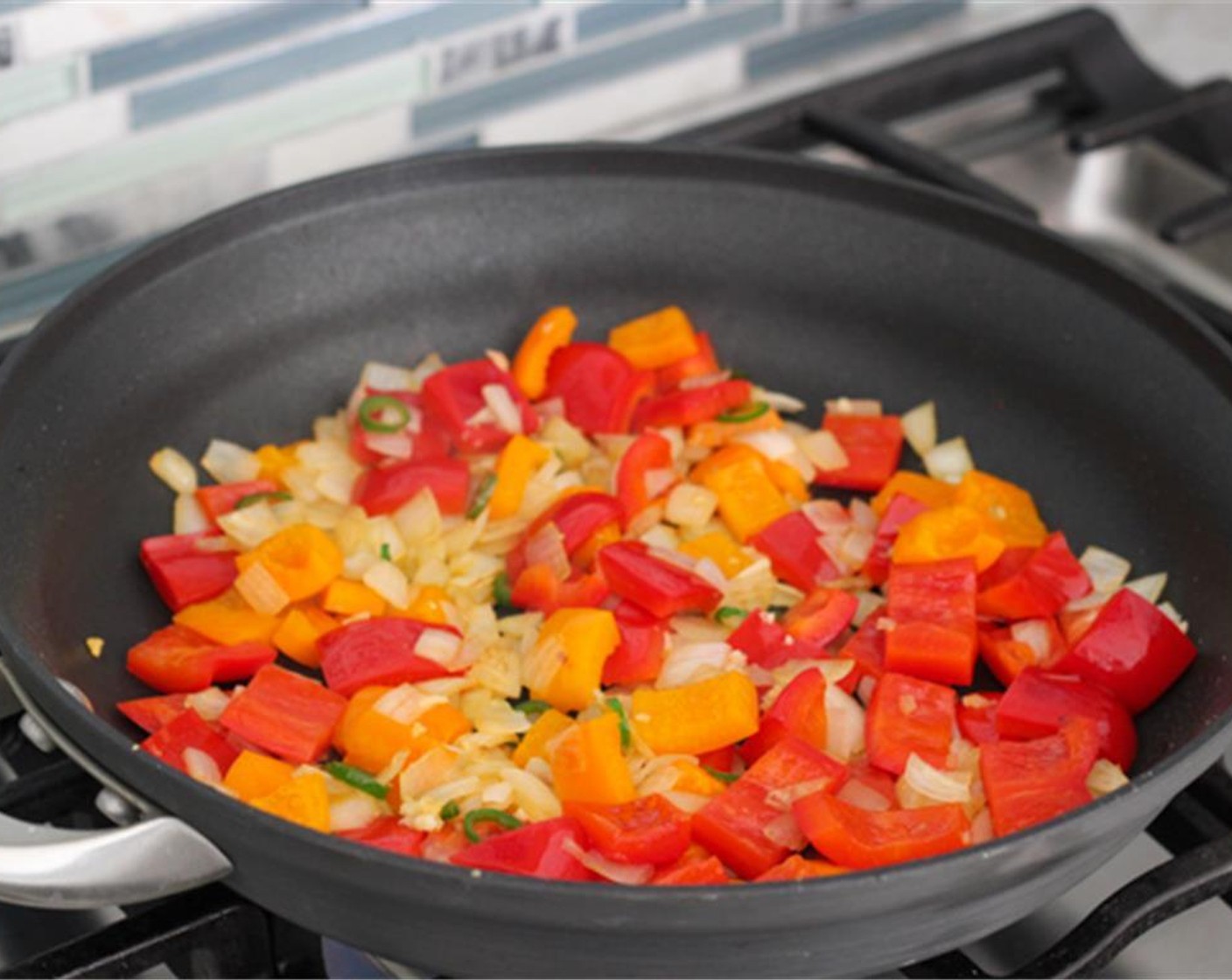 step 8 Add the chopped red bell pepper, yellow bell pepper, jalapeño pepper and Salt (to taste). Cook for another 3-5 minutes until the peppers soften.