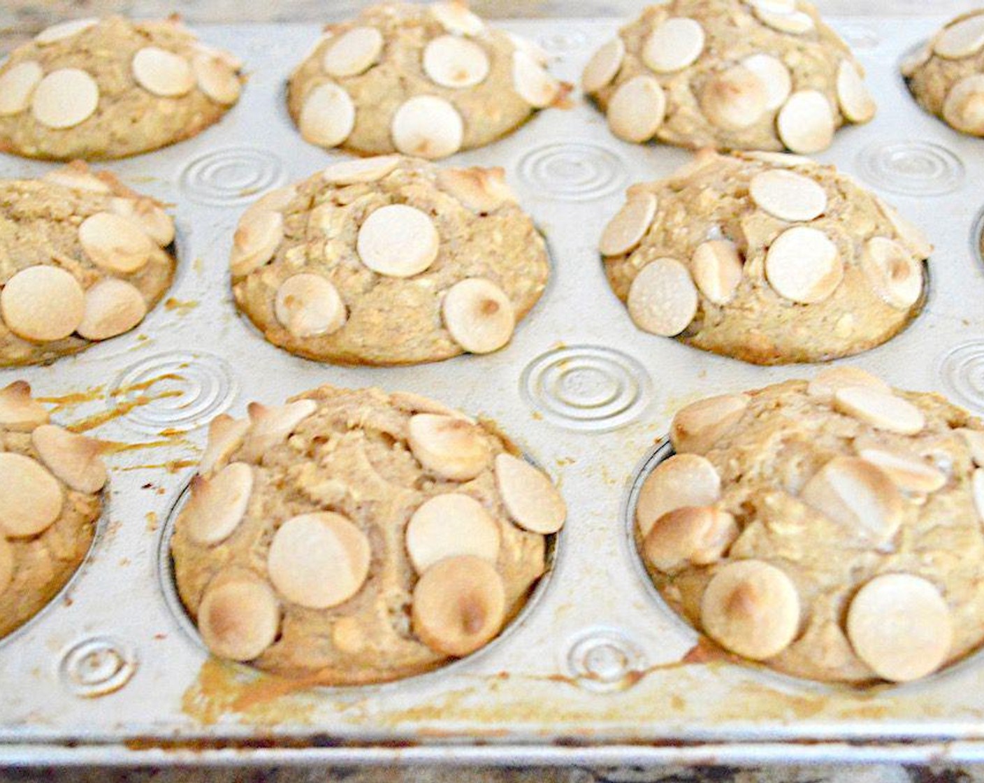 step 5 Bake the muffins until golden brown and baked through, about 20 minutes. Insert a toothpick into the center and check that it comes out clean.