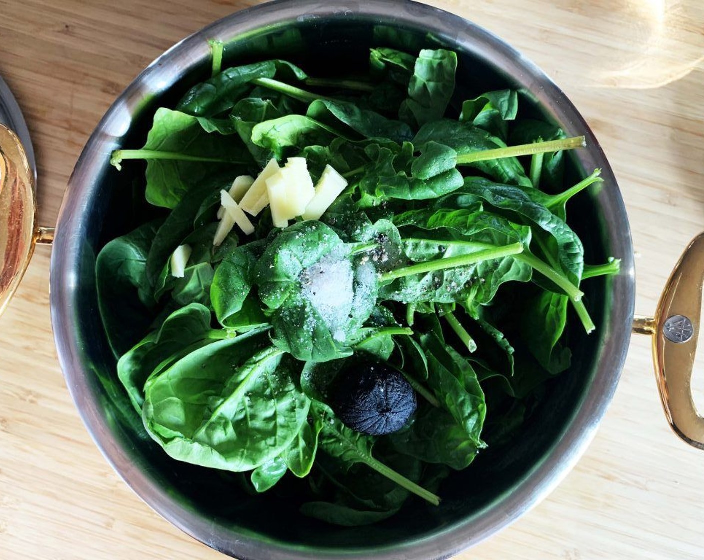 step 1 In a large pot, place Fresh Baby Spinach (16 2/3 cups), Black Garlic (1 clove), Himalayan Rock Salt (1 tsp), Ground Black Pepper (to taste), and about 2 cups of Water (to taste).