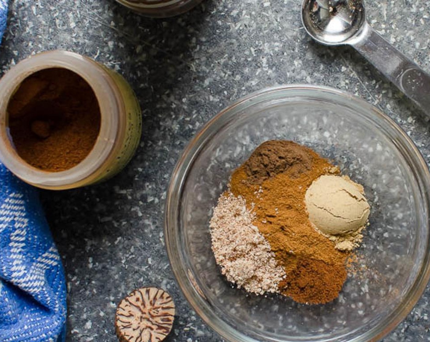 step 4 In a small bowl, stir together the Ground Cinnamon (1 tsp), Ground Ginger (1/4 tsp), Ground Nutmeg (1/2 tsp), Ground Allspice (1/8 tsp), Ground Cloves (1/8 tsp), and Kosher Salt (1/4 tsp). Set aside.