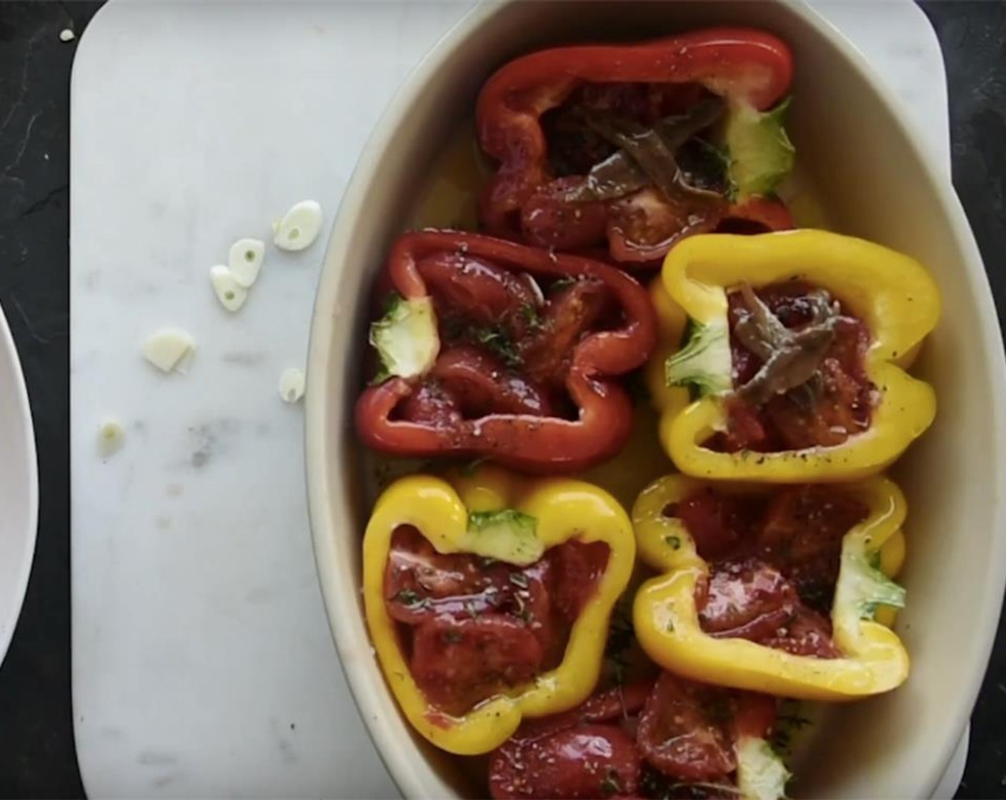 step 6 Top each pepper with 2 Anchovy Fillets (8) each.