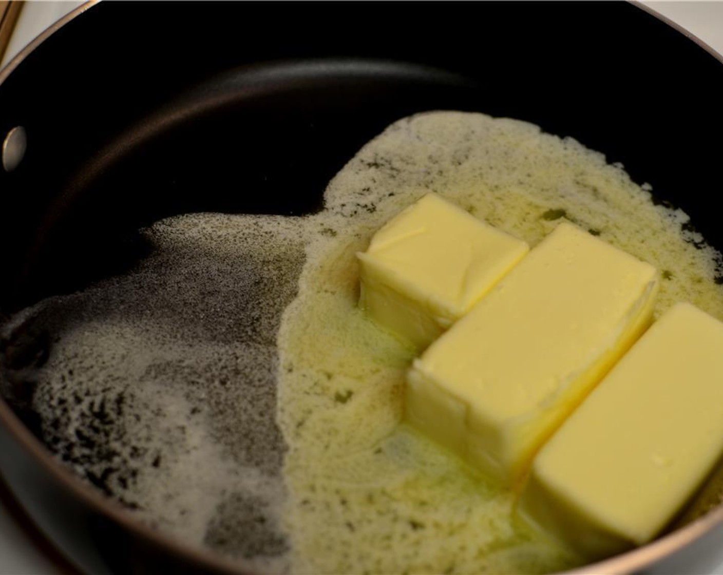 step 2 Melt the Butter (1 1/4 cups) gently in a sauce pan, on medium heat.