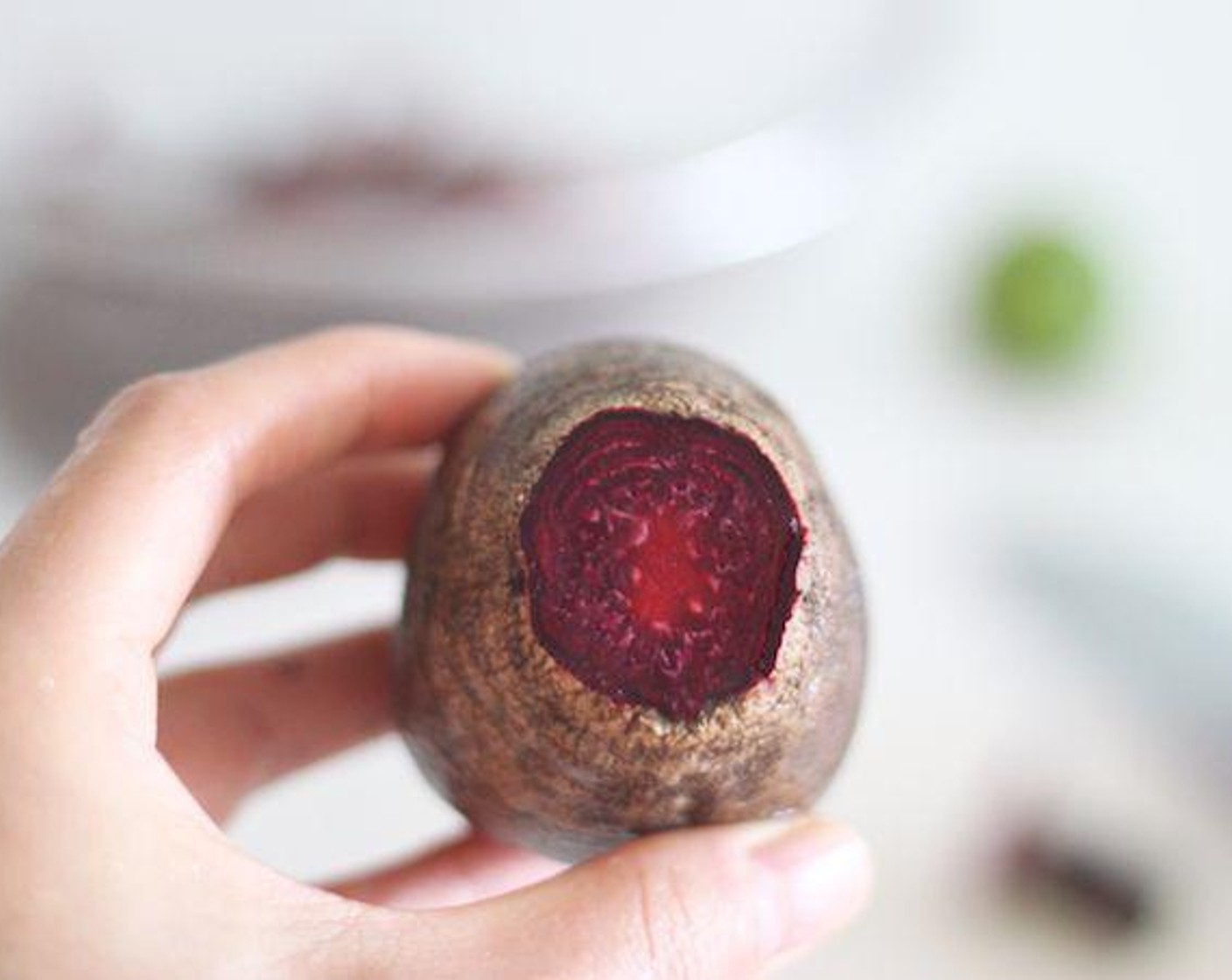 step 1 First, we need to make the All Natural Red Food Coloring. Begin by peeling and chopping the Beet (1).