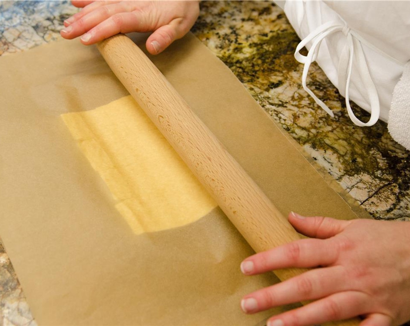 step 4 Meanwhile, shape the remaining butter into a wide, flat rectangle, about 5×8-inches. Wrap in parchment paper, then wrap tightly in plastic wrap and chill for at least 4 hours or overnight.