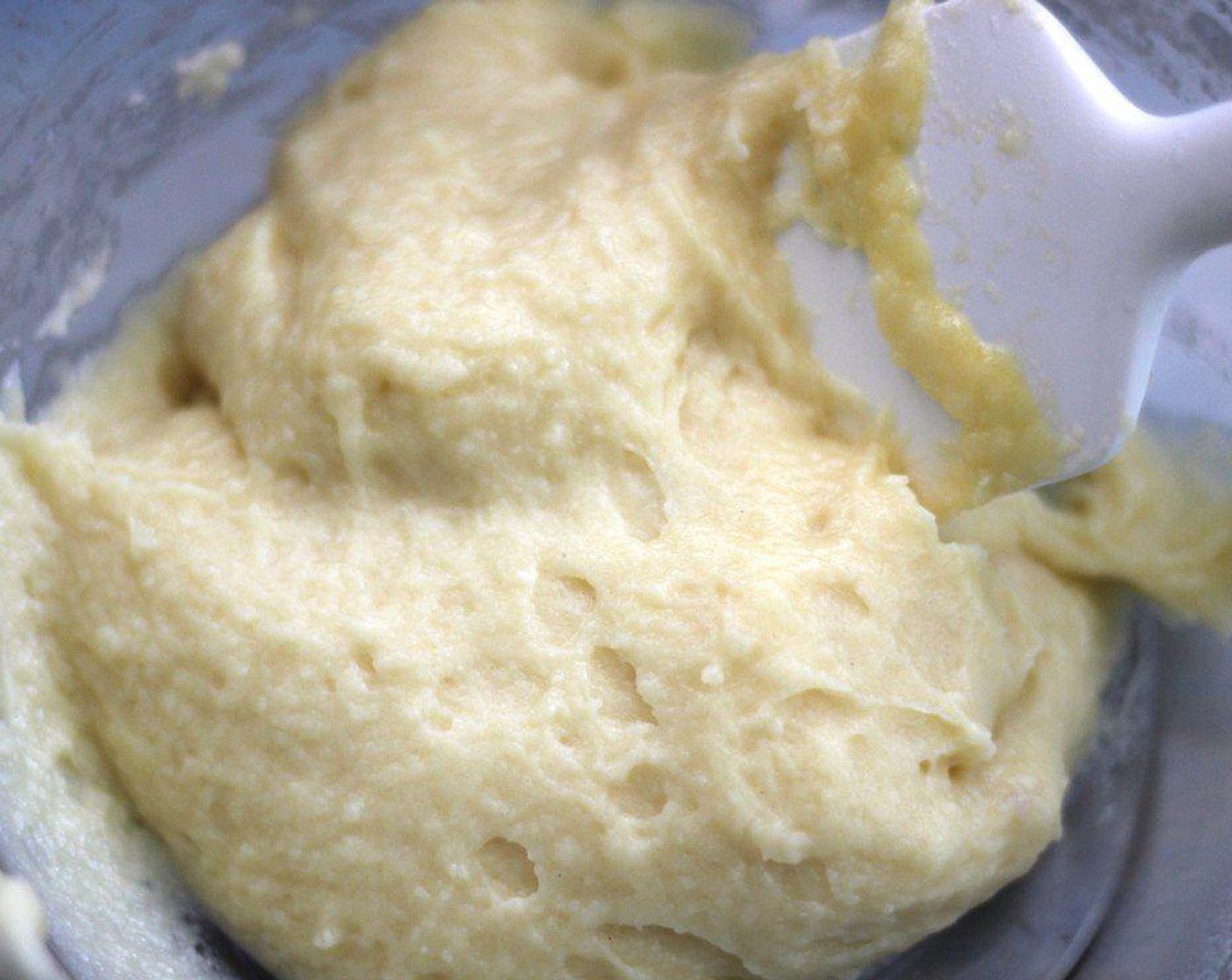 step 4 Spoon dough into a large bowl. Stir for 1 minute to cool. Add 2 Eggs (2), one at a time, mixing in between each addition. It might look like it's curdled, but keep mixing, it'll eventually come together!