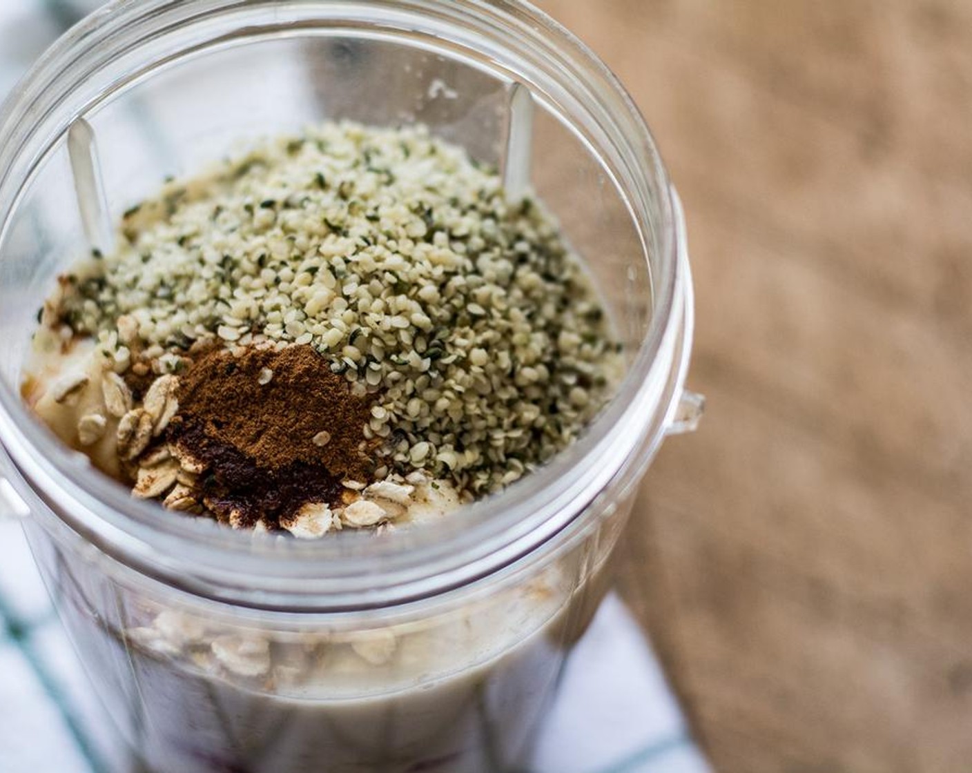 step 1 Add Fresh Papaya (3/4 cup), Fresh Strawberry (3/4 cup), Banana (1), Old Fashioned Rolled Oats (1/4 cup), Hemp Hearts (2 Tbsp), Unsweetened Vanilla Almond Milk (1 cup),Ground Cinnamon (1 1/4 tsp), Ground Ginger (1/8 tsp), Vanilla Extract (1 tsp), Honey (1 1/2 Tbsp), {@10:} to a Blender, blend 20-30 seconds or until smooth and creamy.