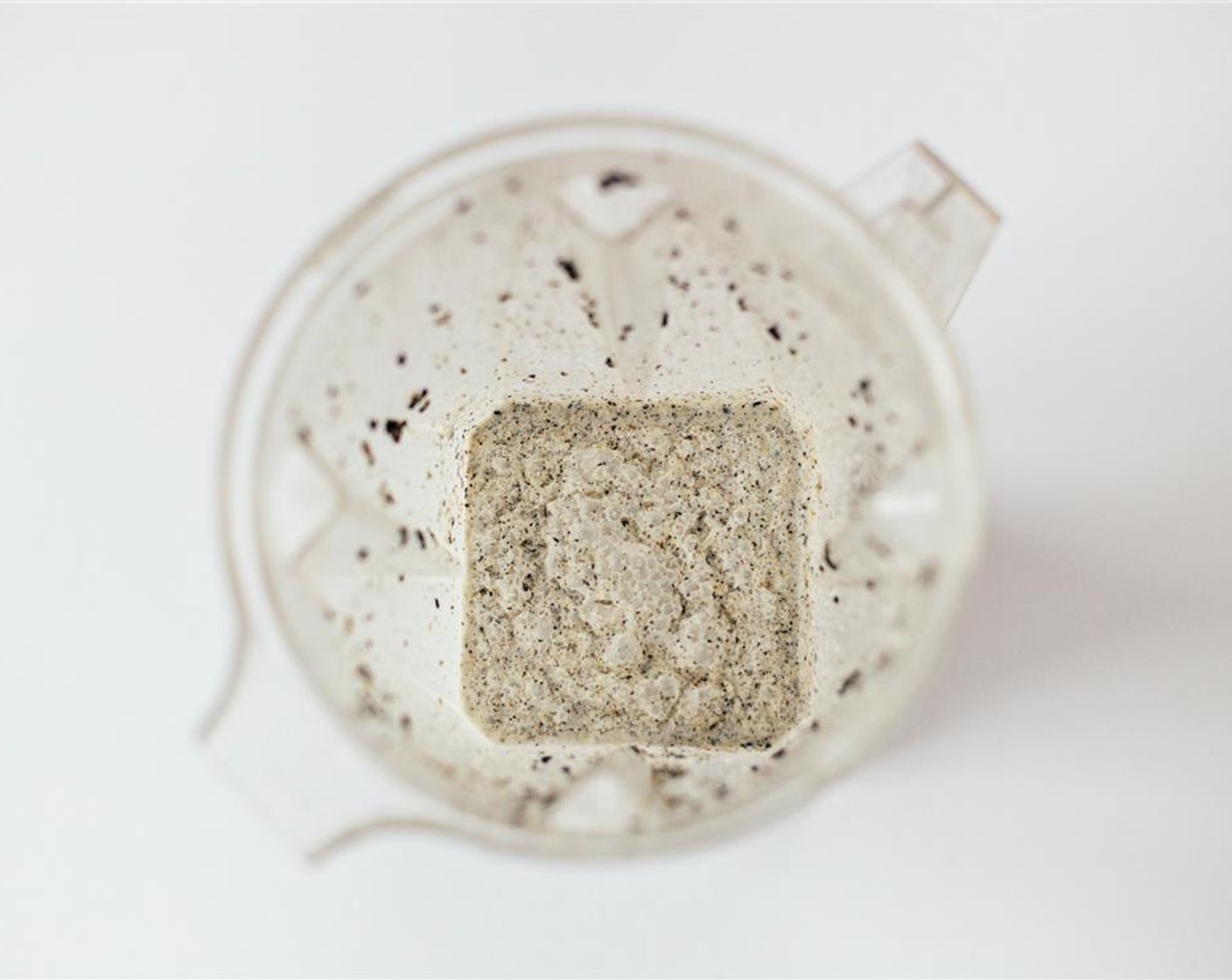 step 2 Combine ground sesame seeds, Coconut Milk (480 mL) and Sweetened Condensed Milk (3 Tbsp) in a blender and blend in short pulses until ingredients are evenly mixed.