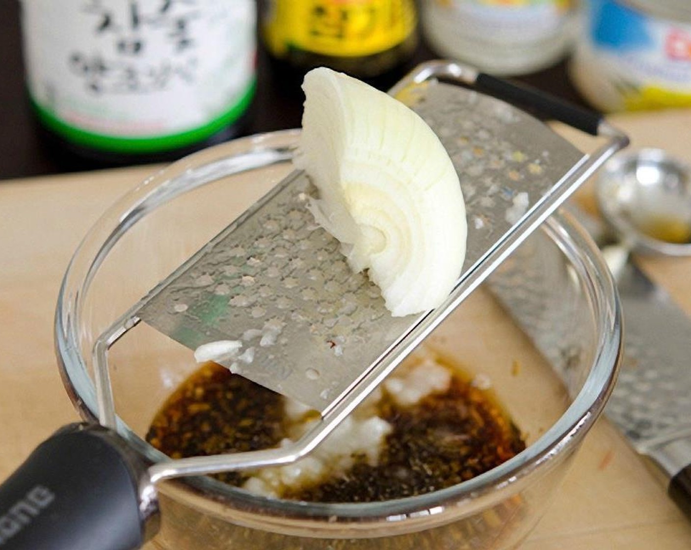 step 4 In a small mixing bowl, combine Low-Sodium Soy Sauce (1/3 cup) Granulated Sugar (3 Tbsp) minced garlic cloves (2), grated onion, and Rice Wine (1 Tbsp).