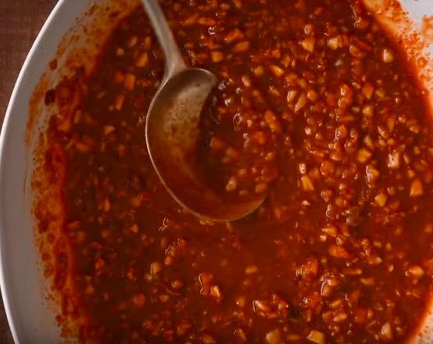 step 5 In a small mixing bowl, combine Fish Sauce (4 Tbsp), Granulated Sugar (1/3 cup), Korean Chili Flakes (2 Tbsp), Shrimp Paste (2 tsp), Gochujang (2 Tbsp), Fresh Ginger (3 Tbsp) and Garlic (3 cloves). Stir in Water (1/3 cup) and mix until well combined.