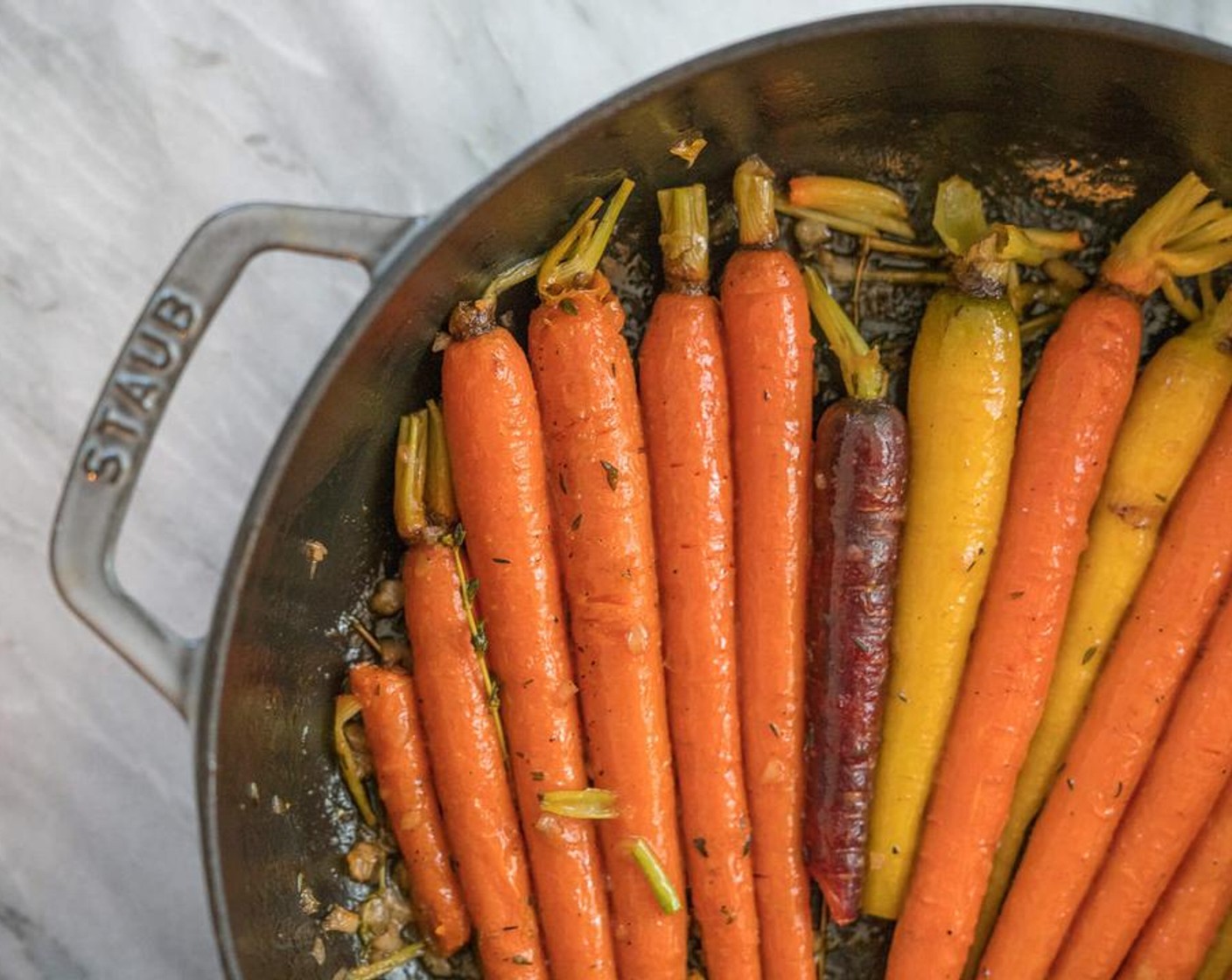 step 6 Then remove the lid and cook for another few minutes until the sauce has reduced down and started to caramelize. Make sure the carrots get turned and well coated.