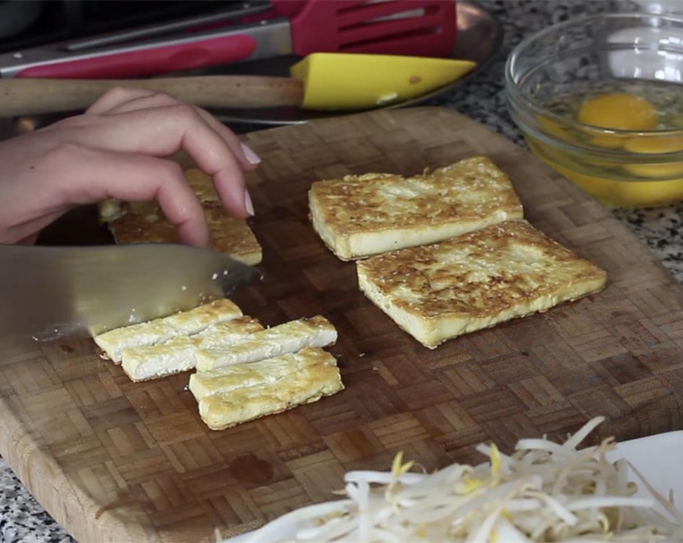 step 11 Slice the cooked tofu into strips.