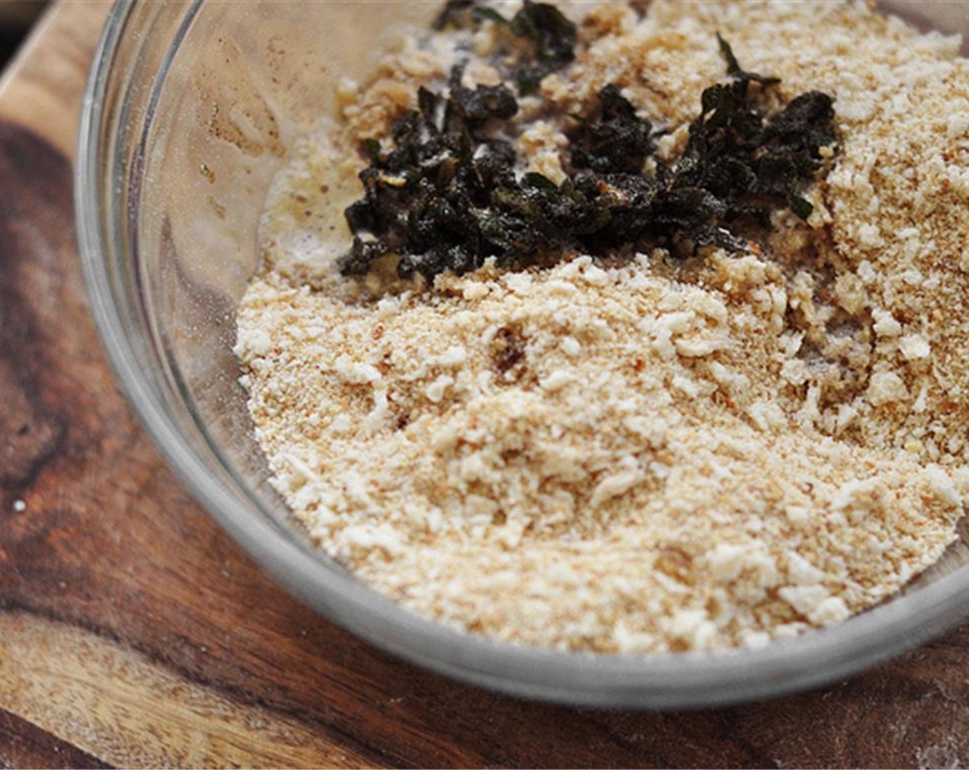 step 10 In a small bowl, combine the Panko Breadcrumbs (1/4 cup) and plain Breadcrumbs (1/4 cup). Add the crispy fresh sage and butter. Stir with a spoon and sprinkle evenly over the mac and cheese.