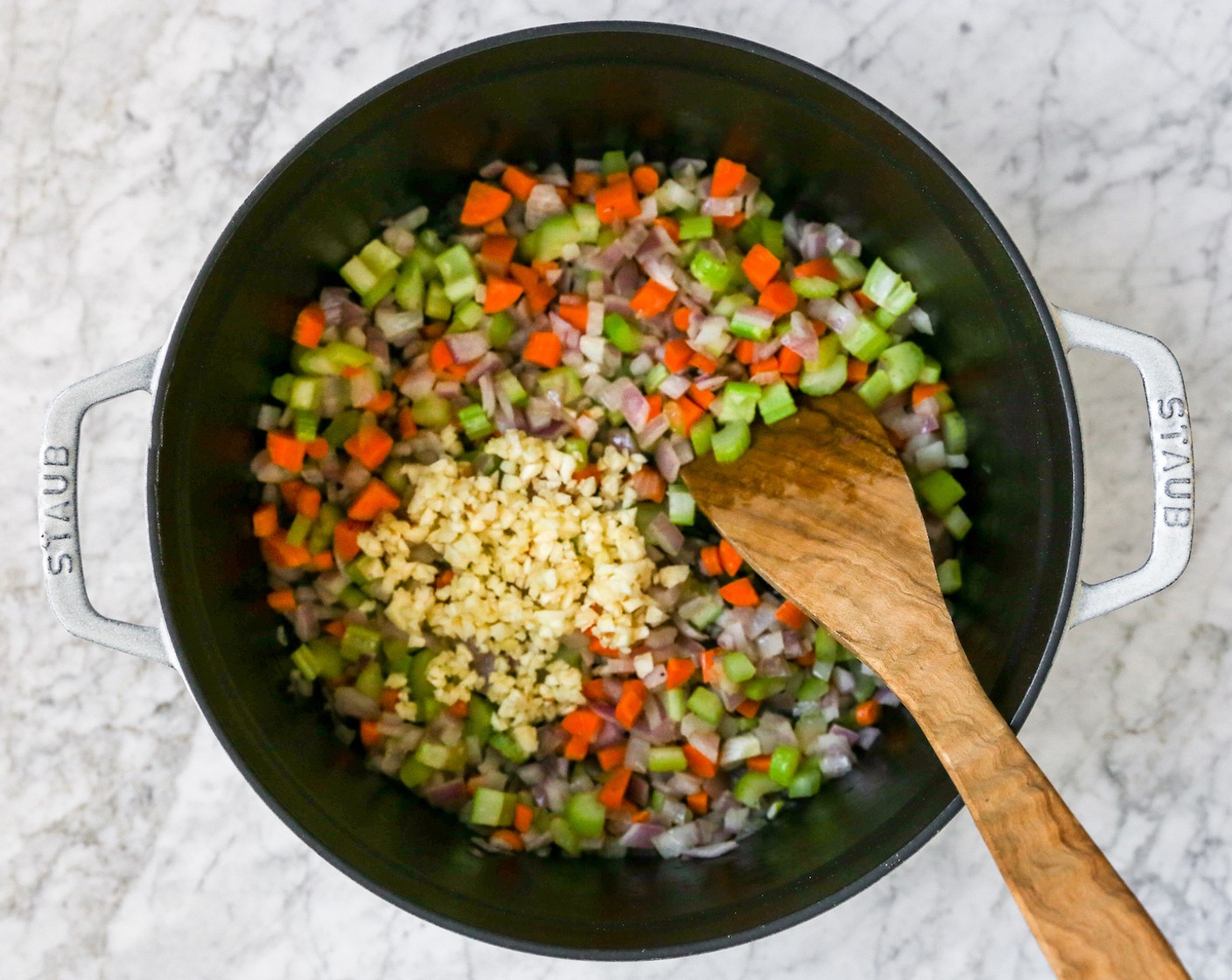 step 3 Add in the Garlic (5 cloves), and stir to combine. Cook for another 5 minutes until the garlic is fragrant and the veggies begin to look caramelized.