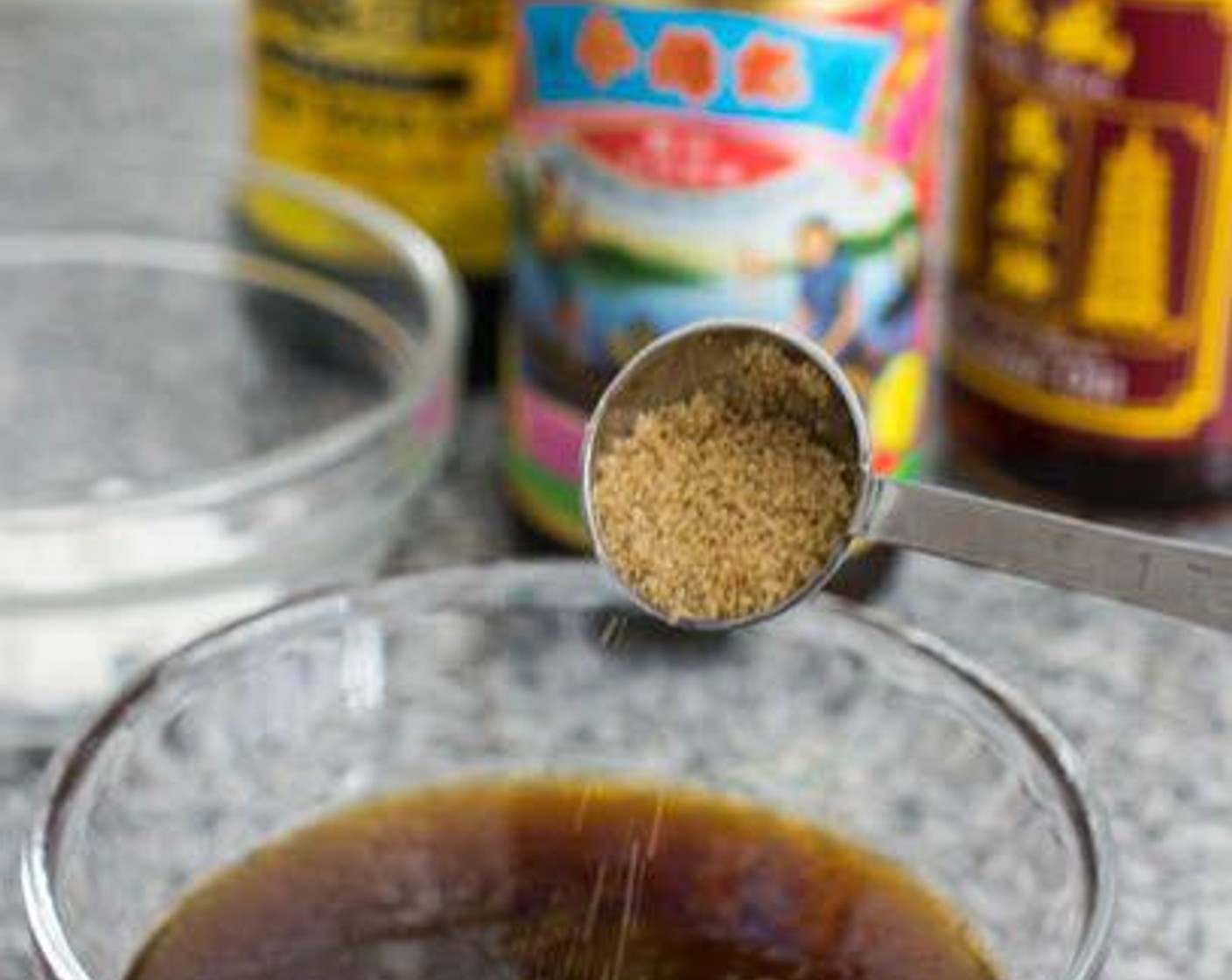 step 2 While waiting for the beef to marinade, prepare the sauce by combining Water (1/2 cup), Soy Sauce (1 Tbsp), Oyster Sauce (1 Tbsp), Sesame Oil (1/2 tsp) and Brown Sugar (1 tsp).