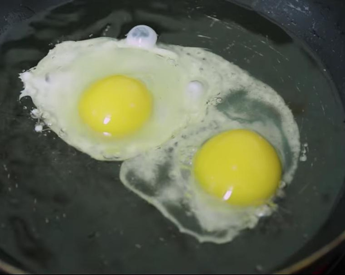 step 4 About 10 minutes before plantains are done, add frying Cooking Oil (2 Tbsp) to a skillet over medium-high heat. Fry the Eggs (to taste) to your liking.