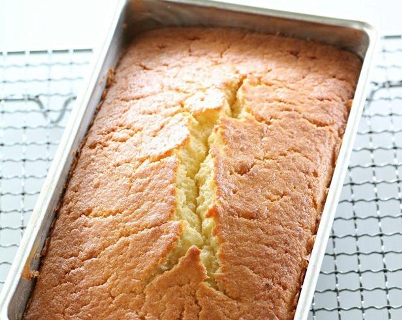 step 6 Bake in the preheated oven for about 70 minutes or until a skewer put into the center of the cake comes out clean.