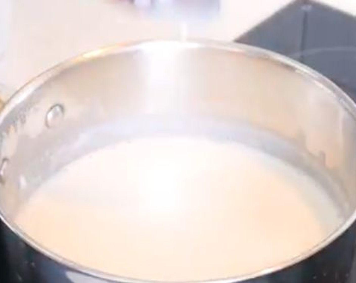 step 2 Then add the Full-Fat Coconut Milk (2 1/2 cups), Ground Cinnamon (1/2 tsp), and Brown Sugar (1 cup) and cook for 10 minutes, stirring often to avoid sticking or burning with a wooden spoon at a medium temperature.