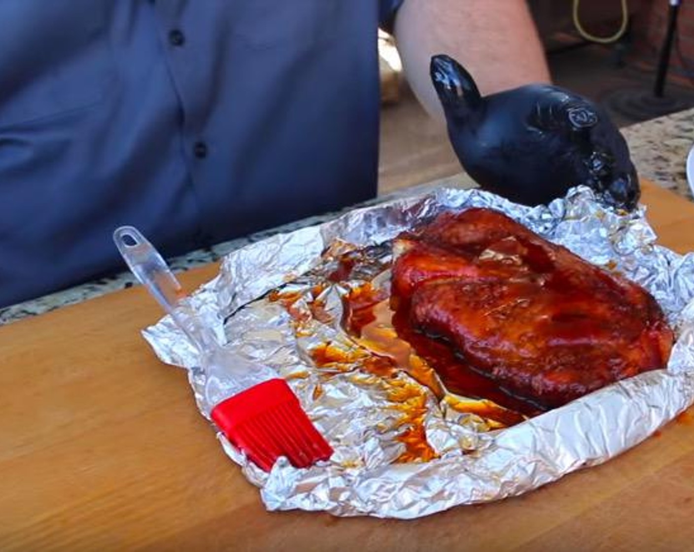 step 6 Carefully unwrap each pork steak and brush each side with Barbecue Sauce (8 fl oz).