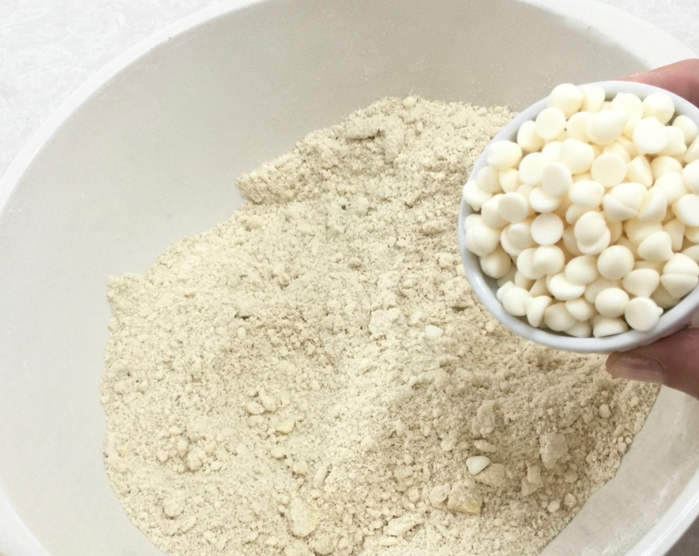 step 10 Next, add in White Chocolate Chips (4 Tbsp). This adds sweetness to the muffins as fruit mince is less sweet.