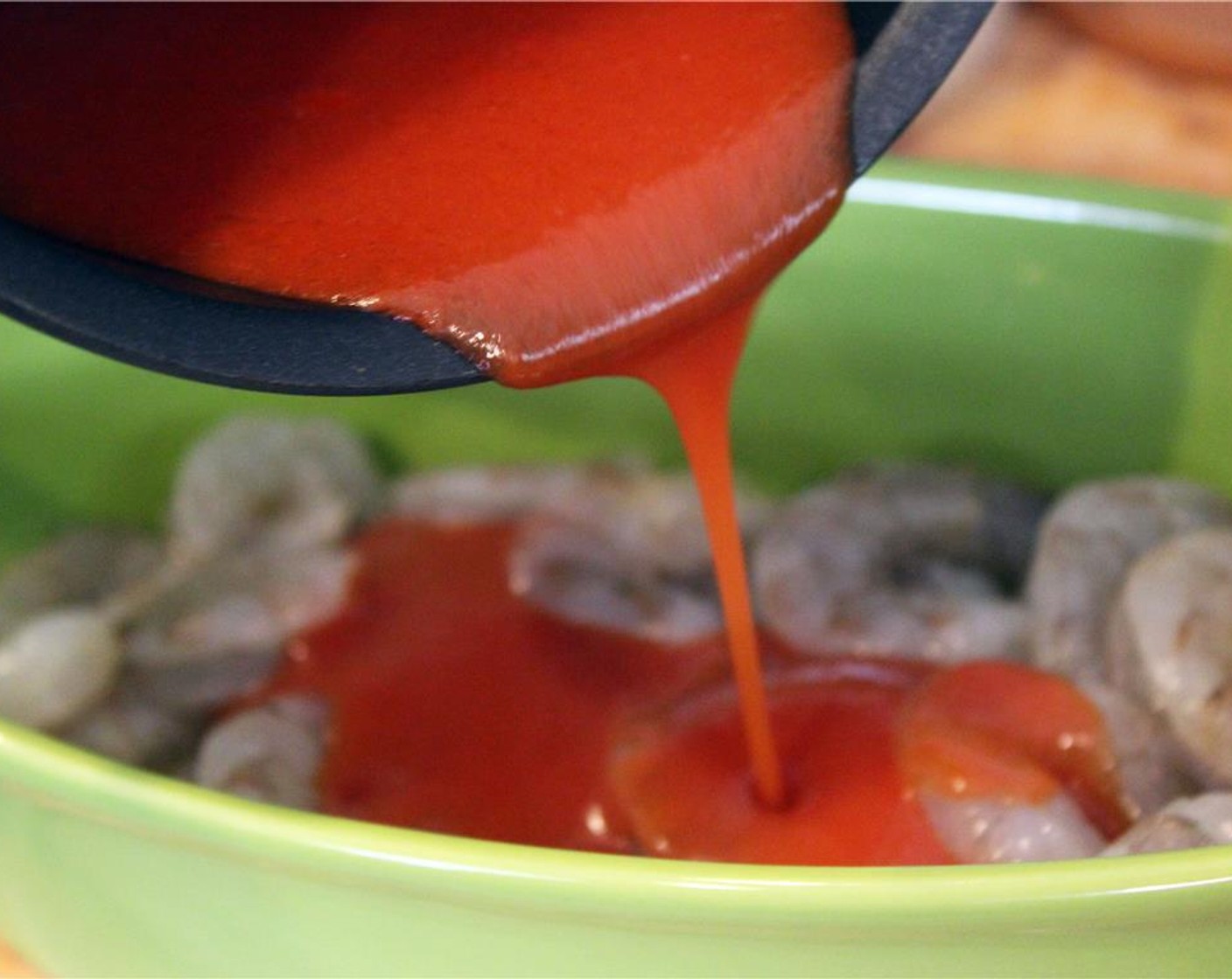 step 3 Pour the sauce over the shrimp and crumble Blue Cheese (1/2 cup) on top.