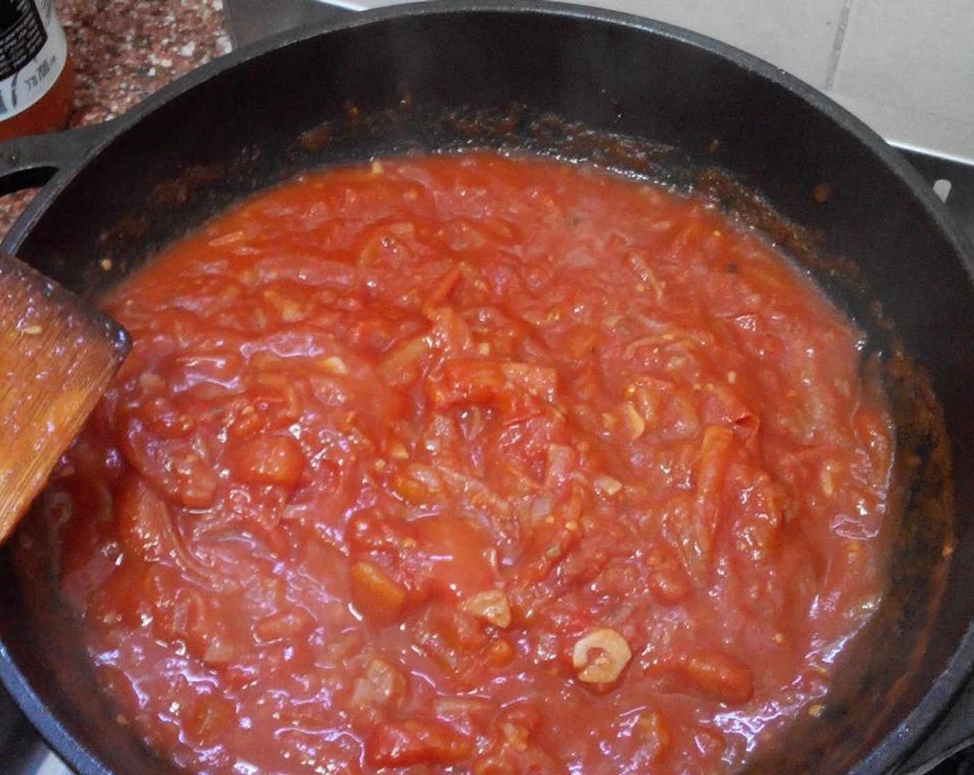 step 6 Reduce the tomatoes sauce for about 5 to 7 mins untill it thickens.