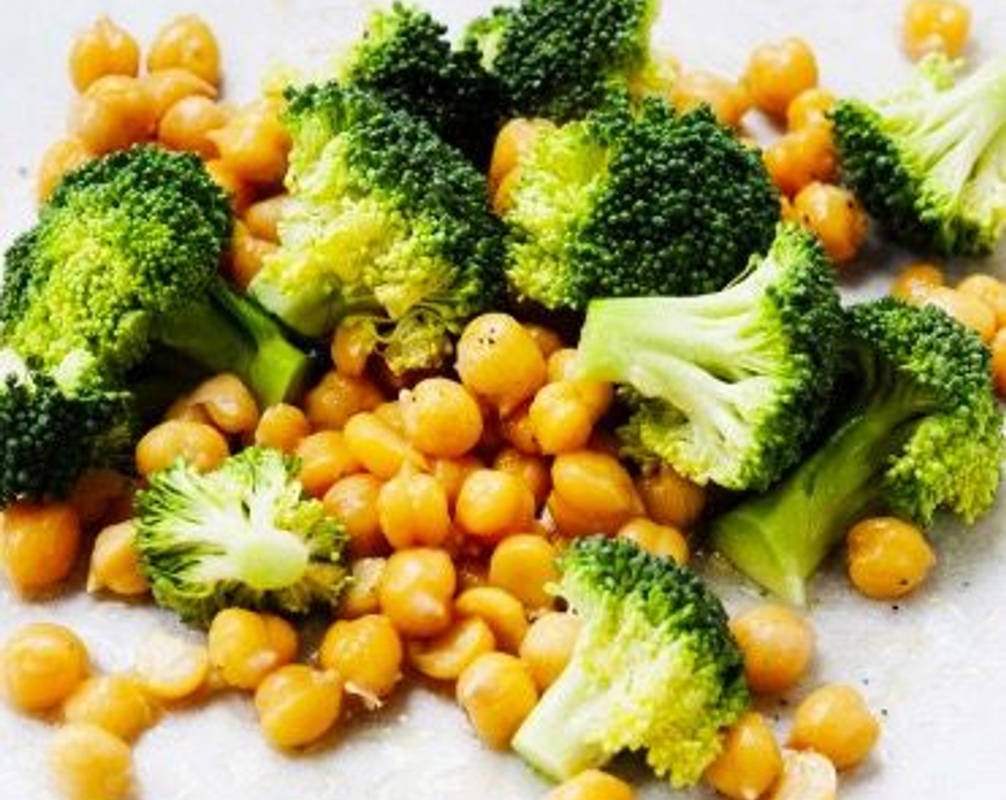 step 2 Toss together the Dried Chickpeas (1 cup), Broccoli Florets (1 cup), Extra-Virgin Olive Oil (1 Tbsp), juice from the Lemon (1/2), Kosher Salt (to taste), and Freshly Ground Black Pepper (to taste).